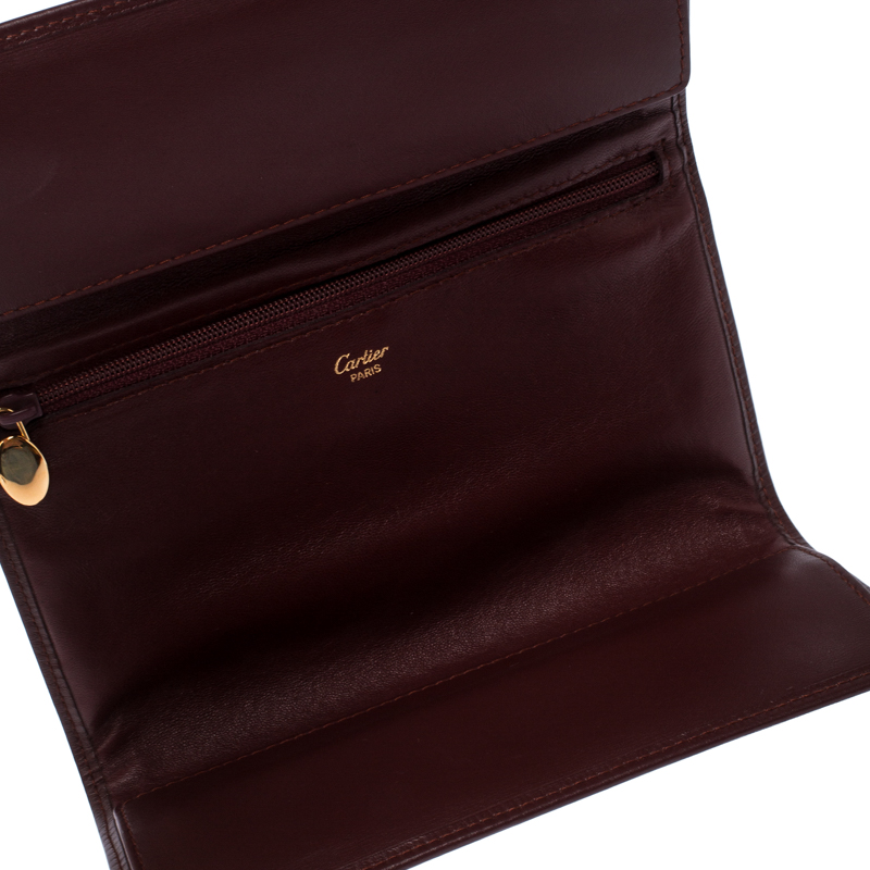 

Cartier Maroon Leather Jewelry Pouch, Burgundy