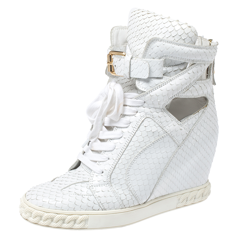 Click to view more detailed imagery on our partner's website Casadei White Python Embossed Leather Wedge Cut Out Chain Motif Buckle Ankle Boots Size 40
