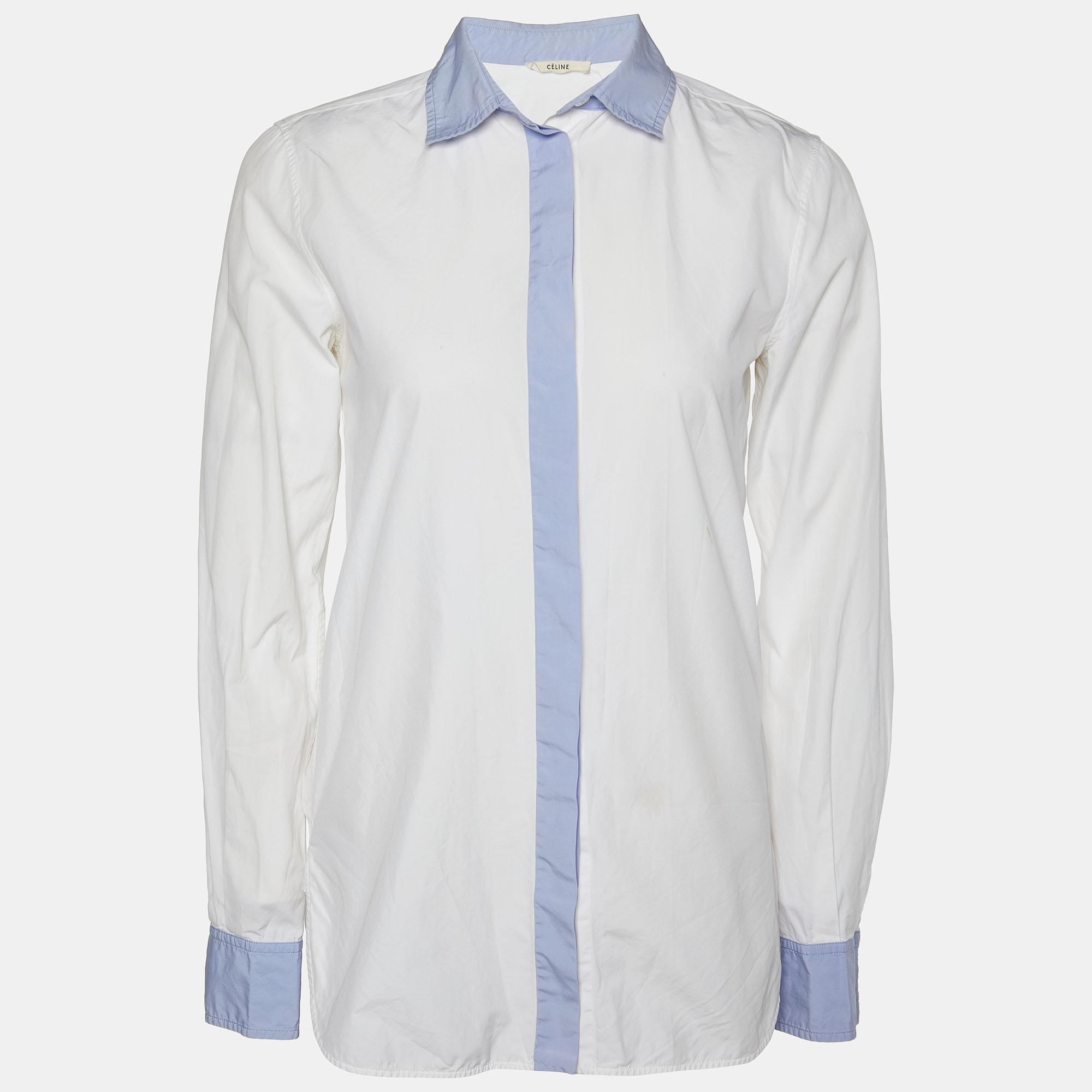 This Celine womens shirt is tailored using cotton fabric into a comfortable shape. It has a simple collar front buttons and long sleeves with buttoned cuffs.