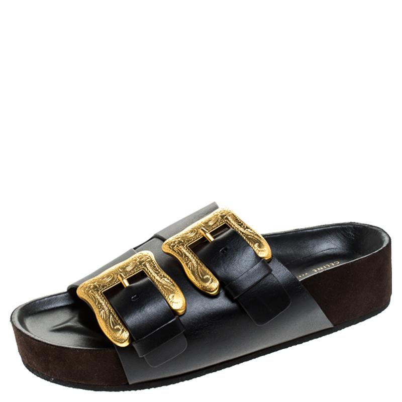 black sandals with gold buckle