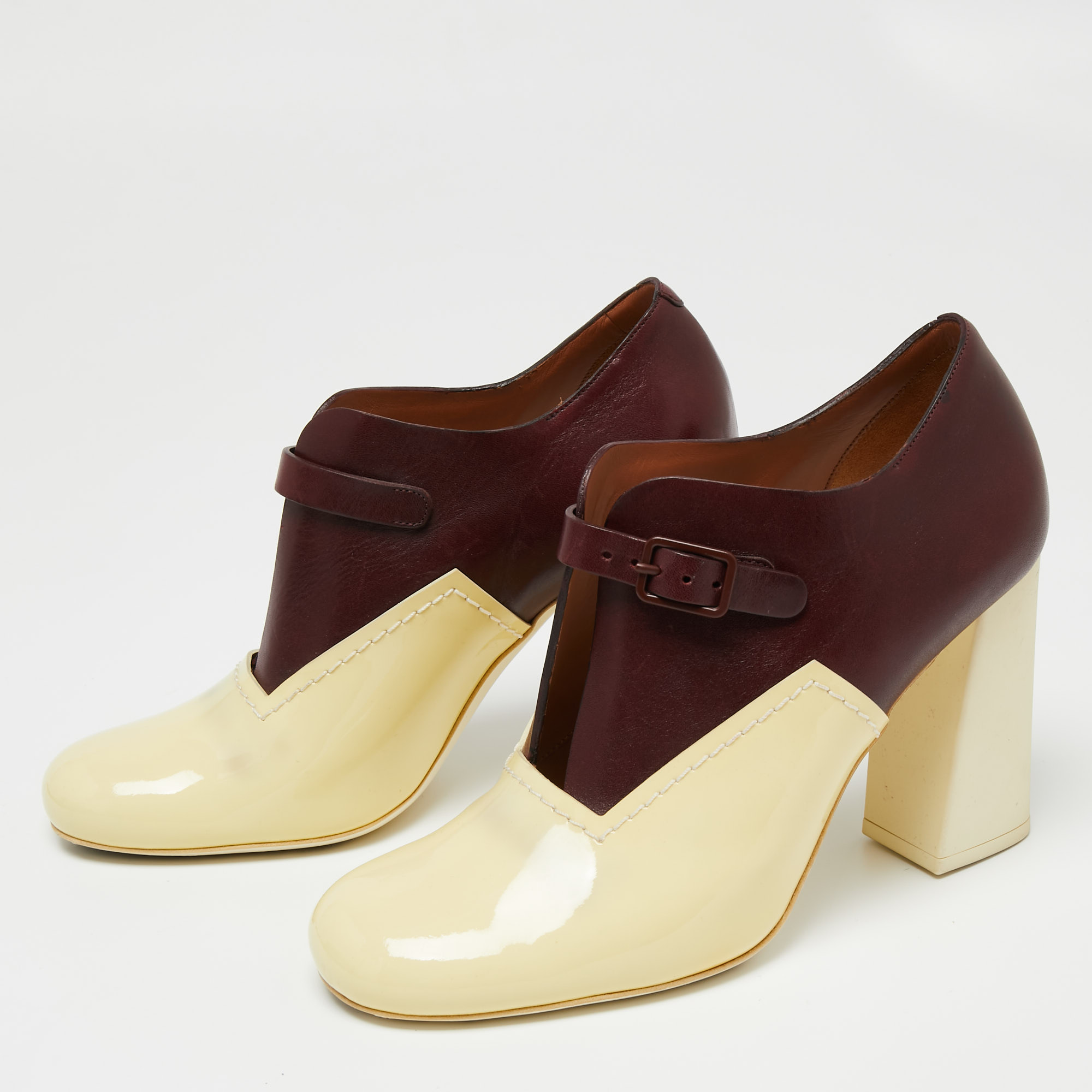 

Celine Burgundy/Cream Leather And Patent Buckle Block Heel Booties Size