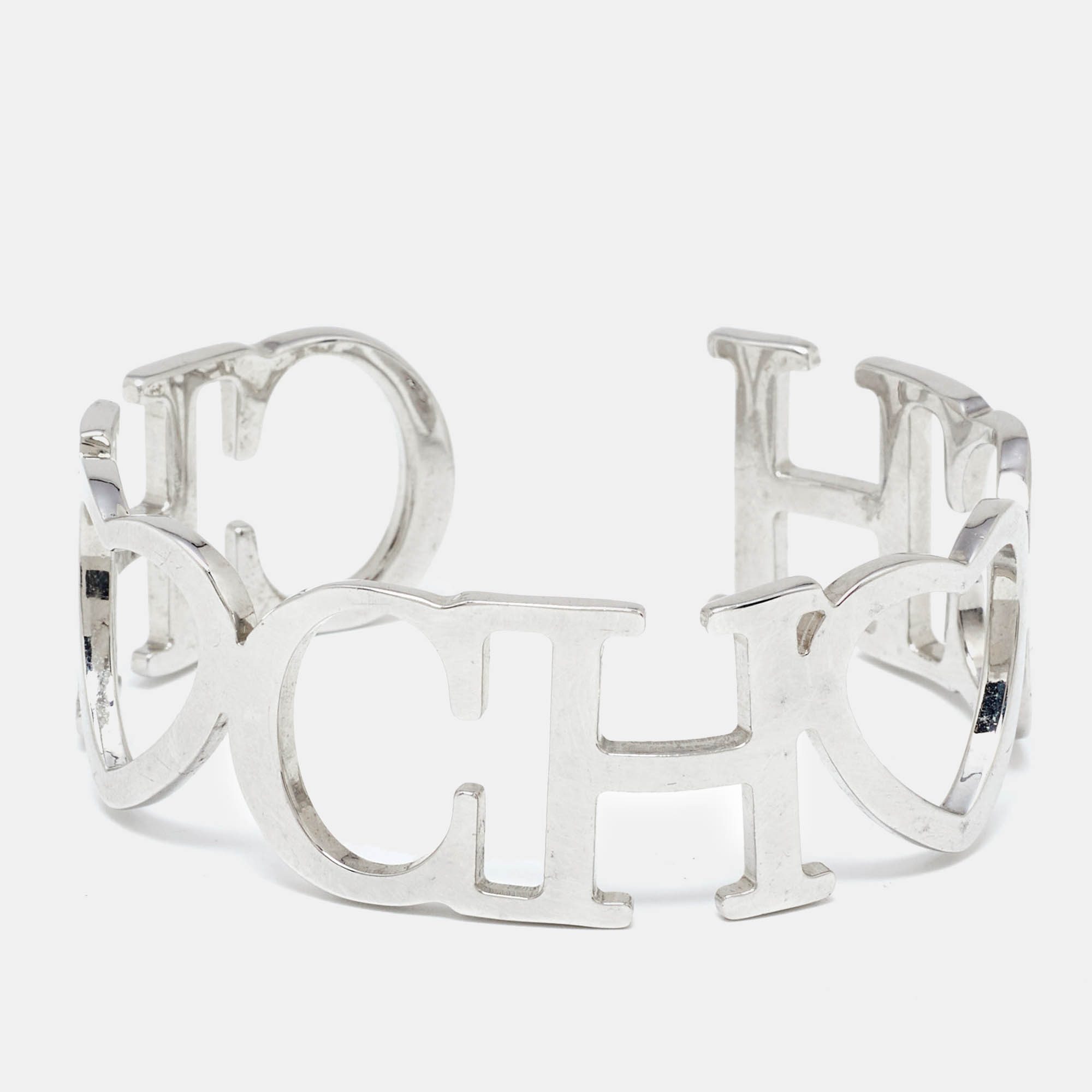 

CH Carolina Herrera Silver Tone Heart & Logo Bangle Bracelet