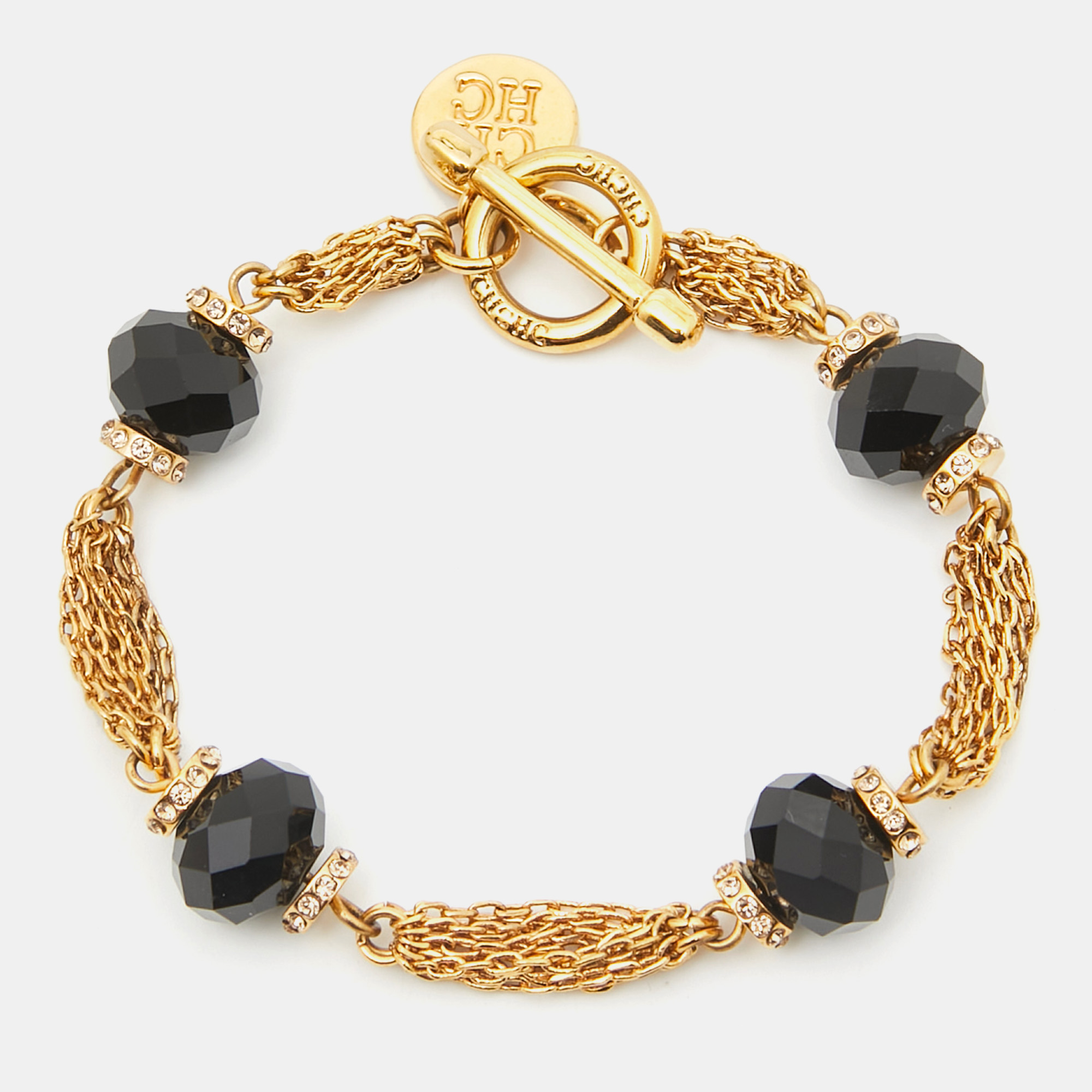 

Carolina Herrera Crystals Gold Tone Multi Strand Black Beaded Toggle Bracelet