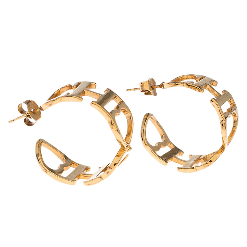 

CH Carolina Herrera Logo Heart Gold Tone Hoop Earrings