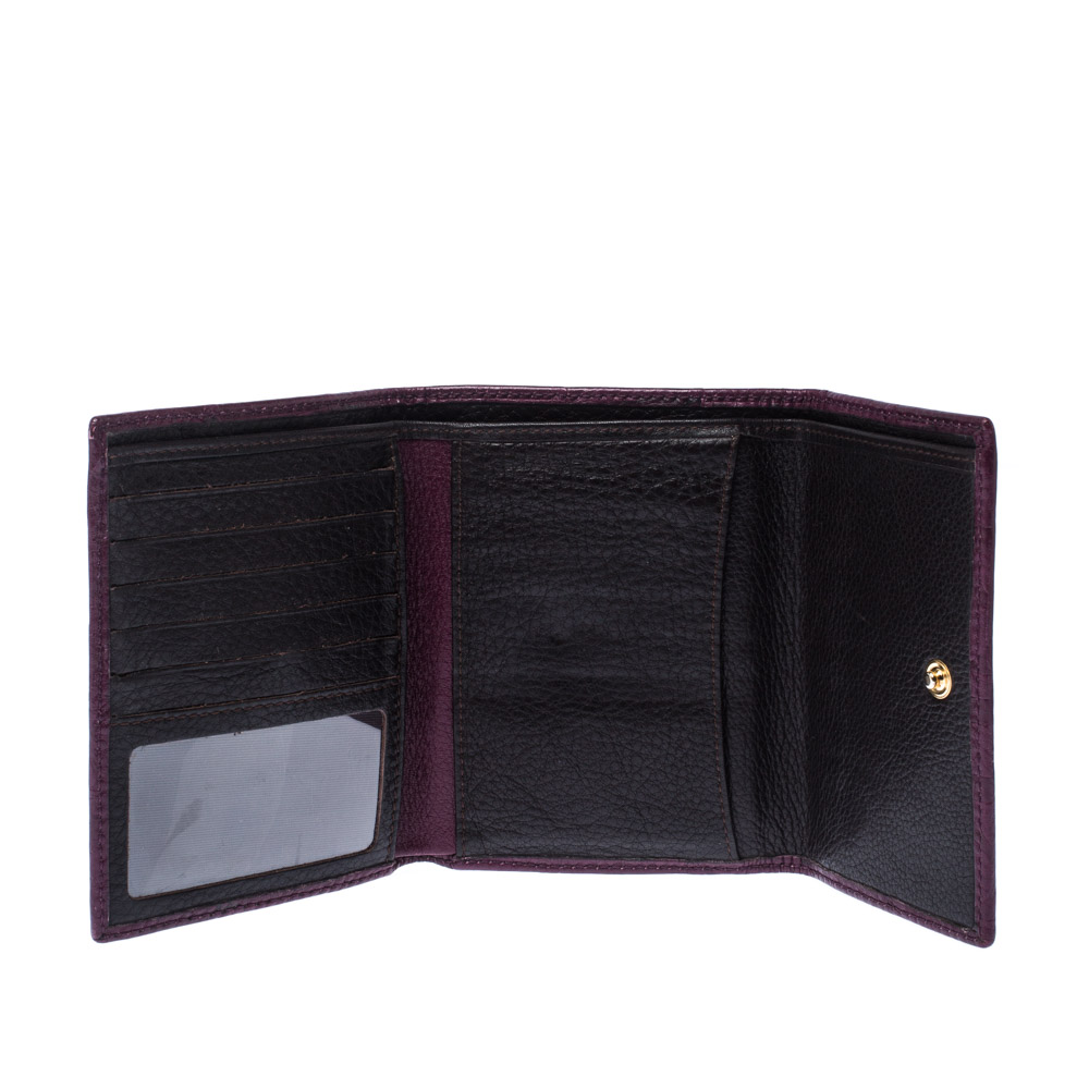

Carolina Herrera Purple Monogram Leather Tri Fold Compact Wallet