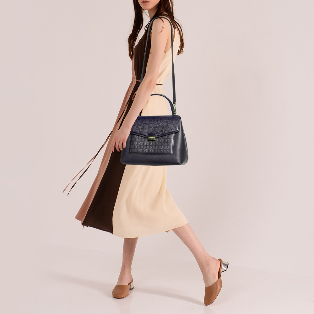 

Carolina Herrera Navy Blue Monogram Leather Pushlock Top Handle Bag