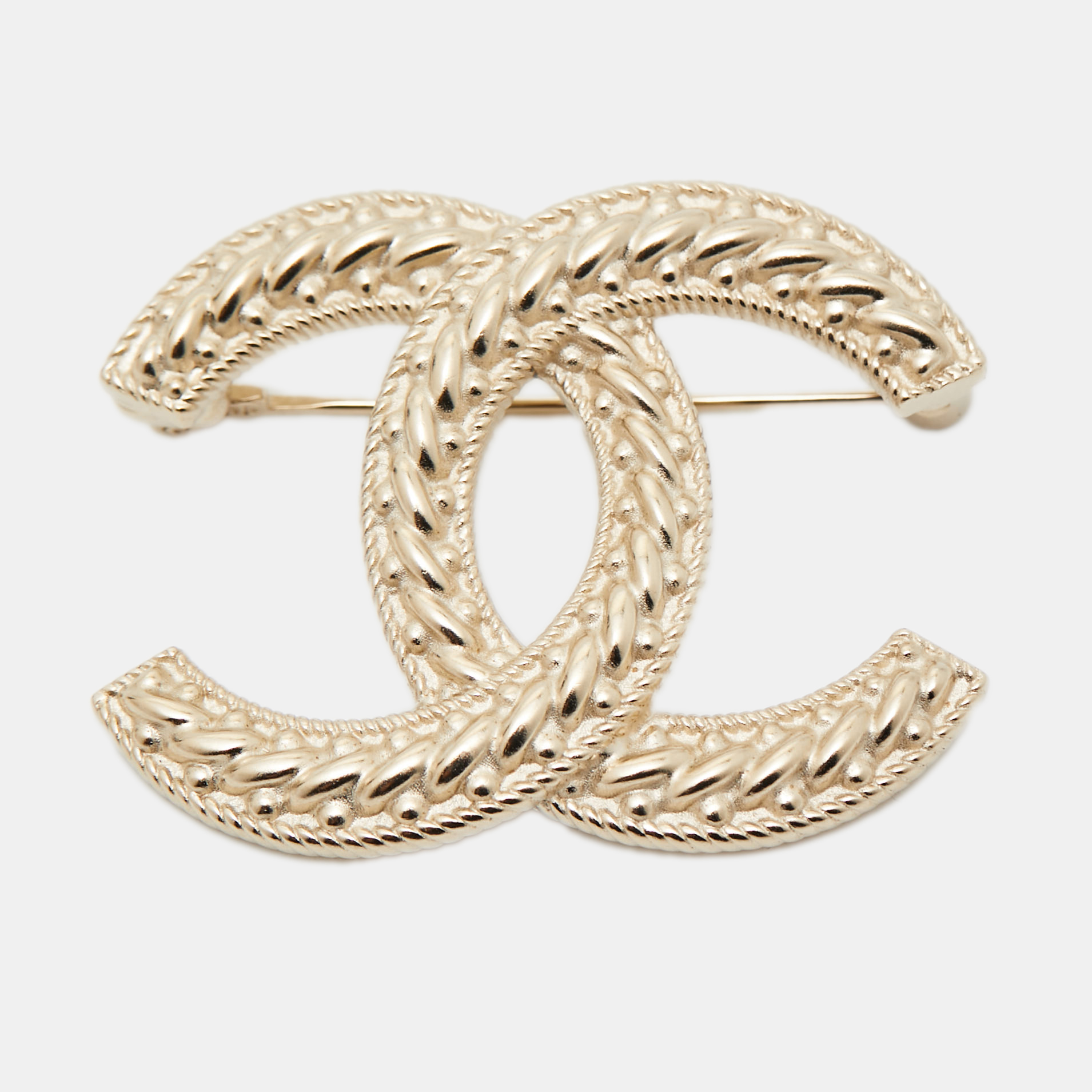 

Chanel CC Gold Tone Brooch