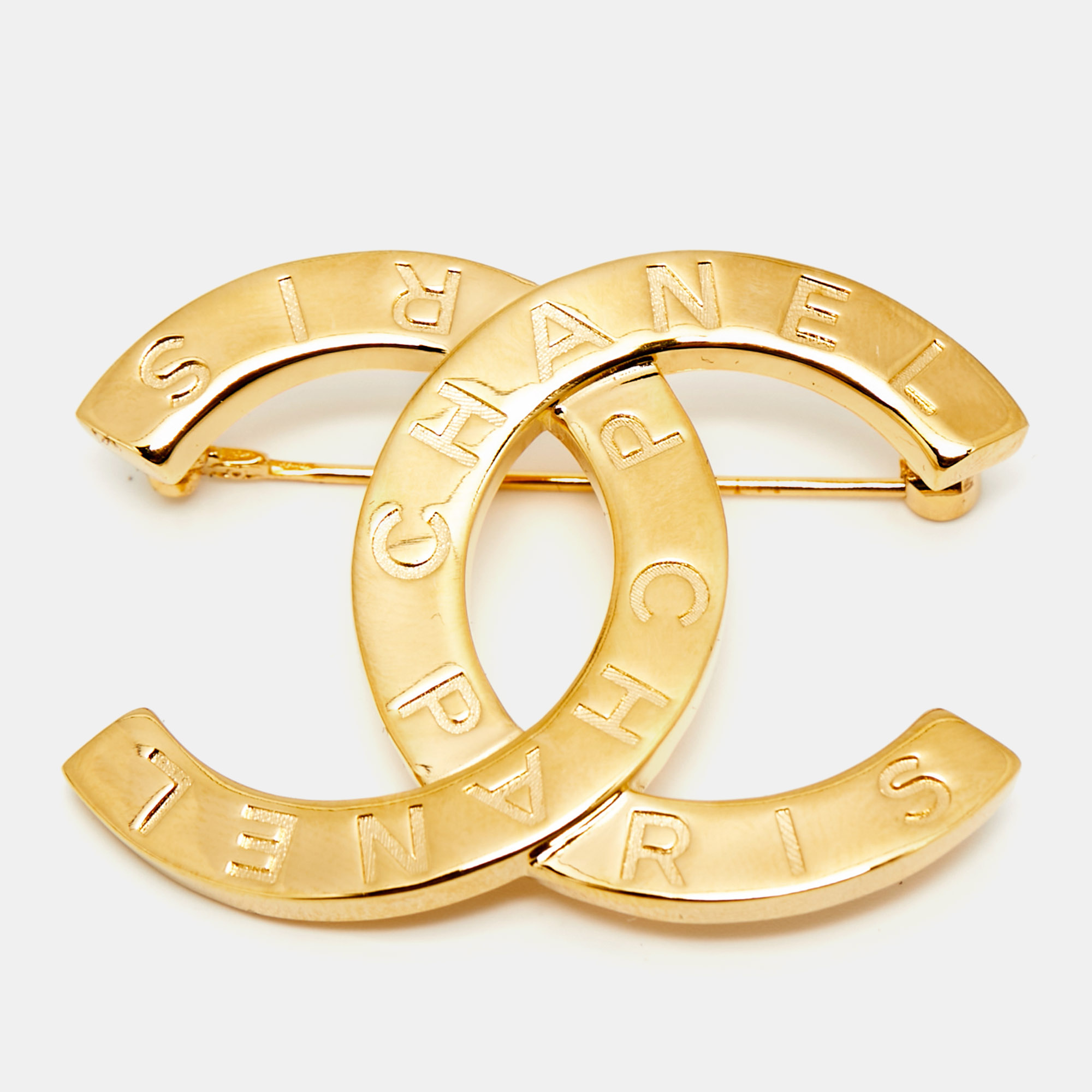

Chanel CC Gold Tone Brooch