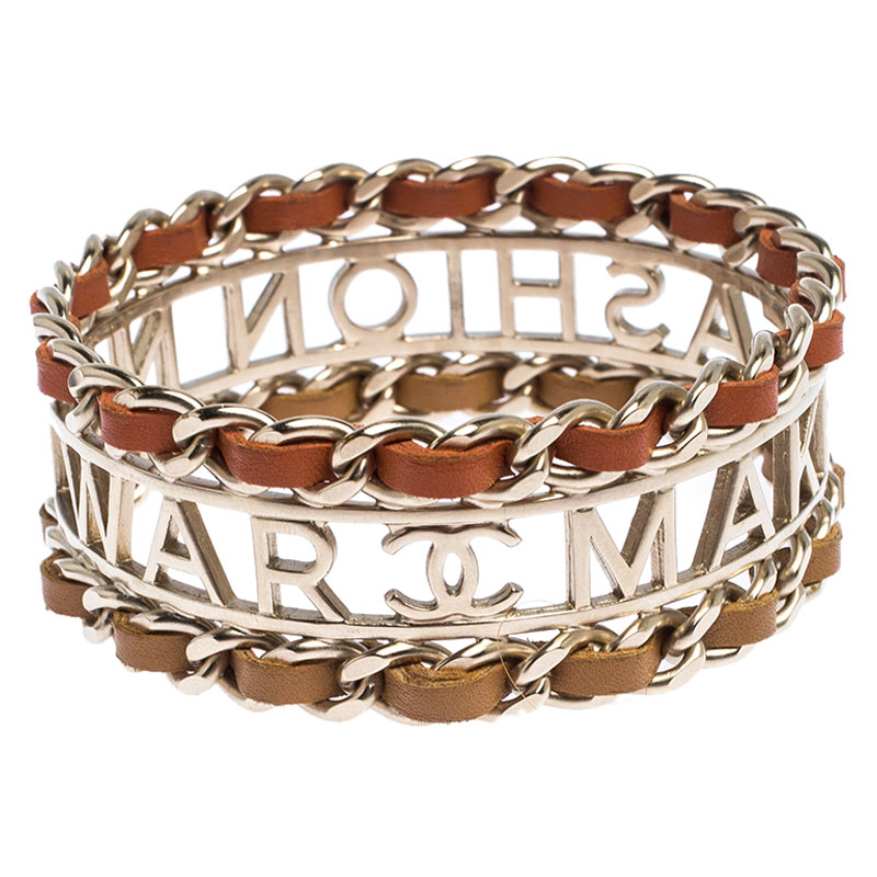 مملوكة مسبقًا Chanel Make Fashion Not War Leather Gold Tone Wide Bangle Bracelet