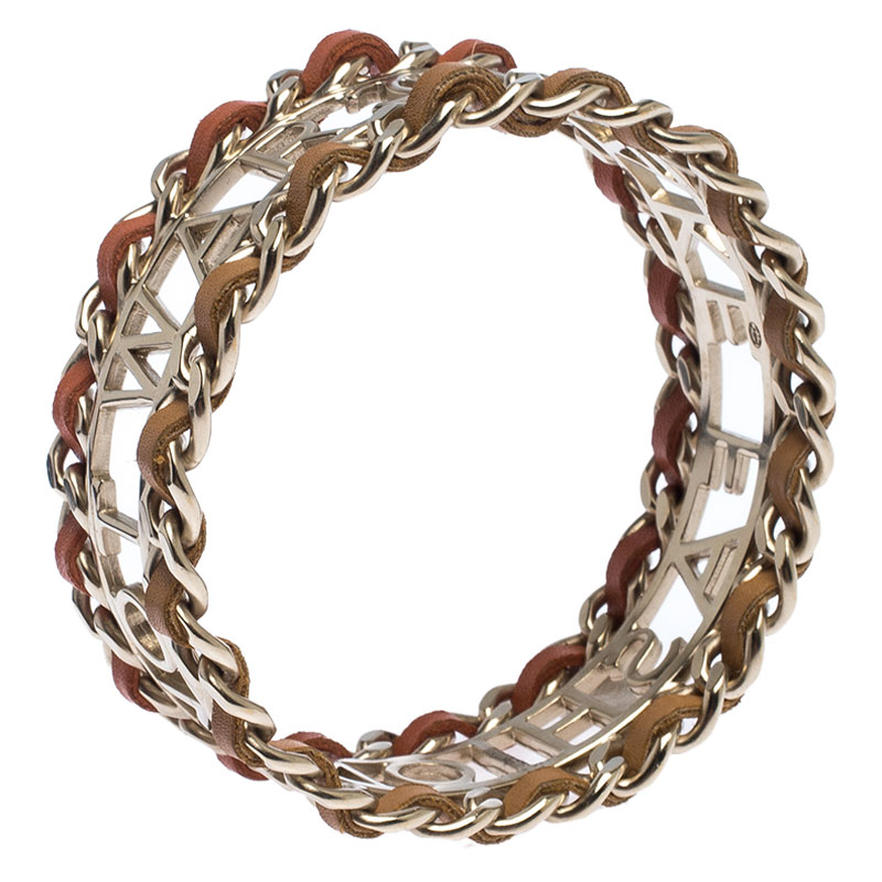 

Chanel Make Fashion Not War Leather Gold Tone Wide Bangle Bracelet, Multicolor