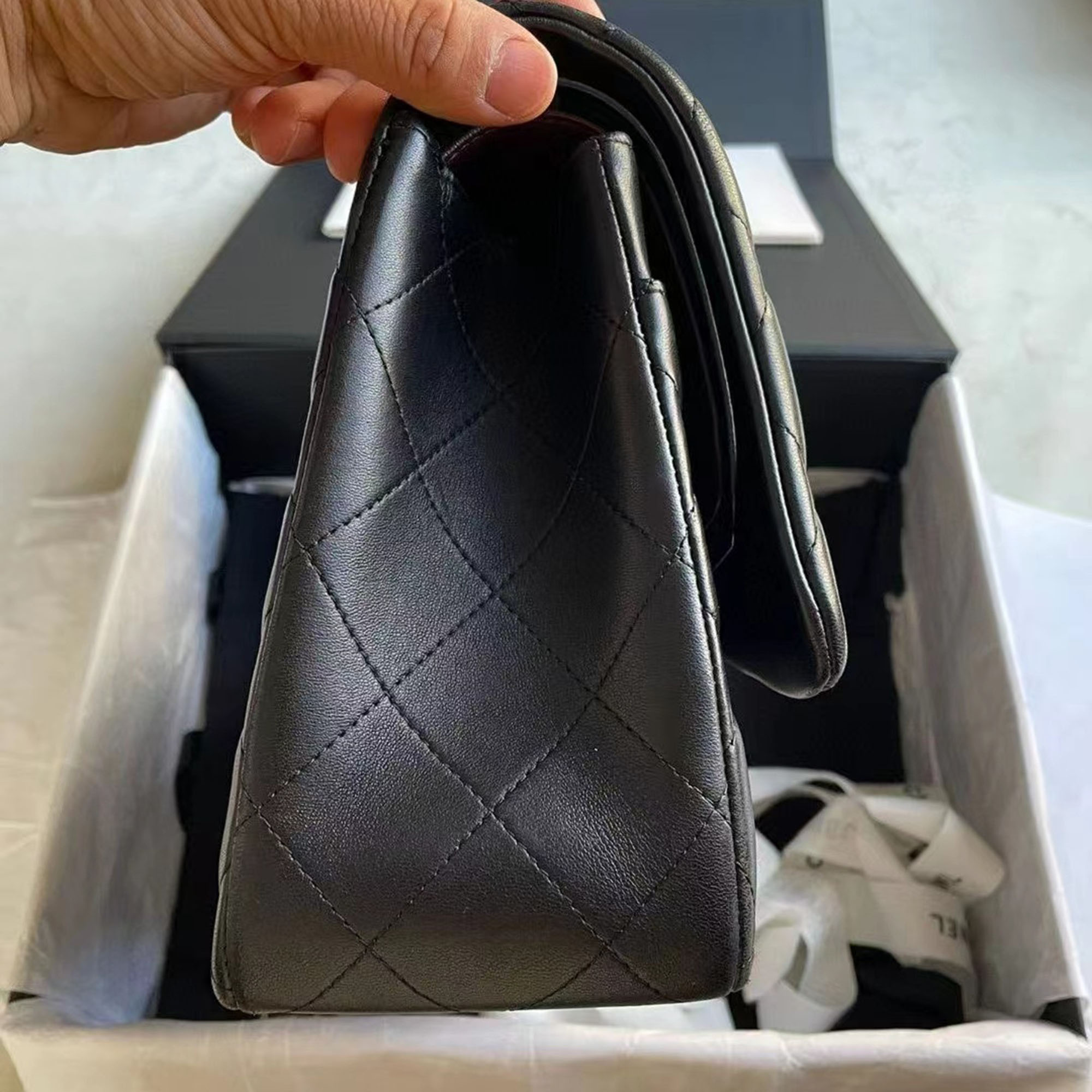 Chanel Black gold Lambskin jumbo bag 
