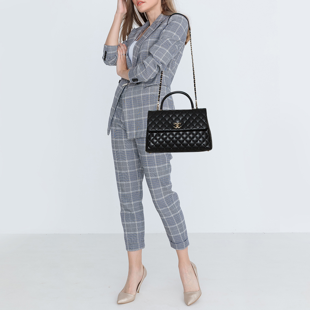 

Chanel Black Caviar Leather Maxi Coco Top Handle Bag