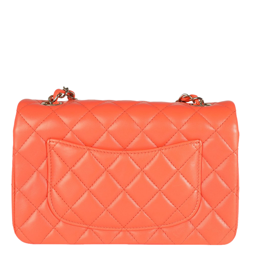 

Chanel Orange Lambskin Leather Mini Classic Flap Shoulder Bag