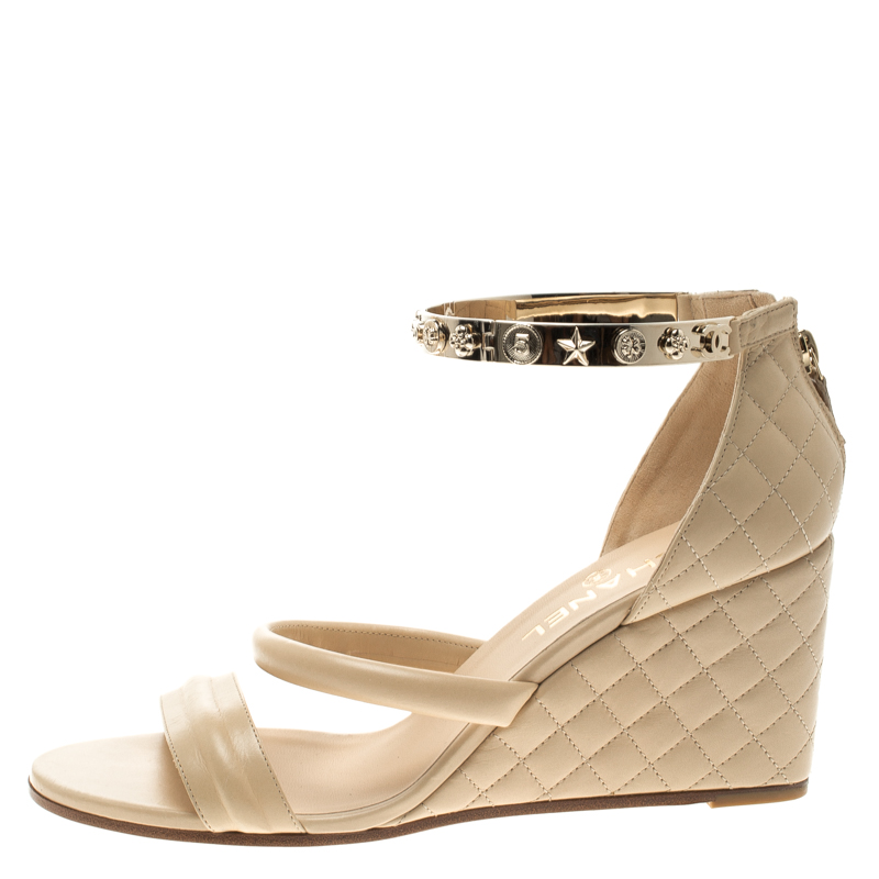 

Chanel Beige Quilted Leather Charm Embellished Ankle Cuff Wedge Sandals Size