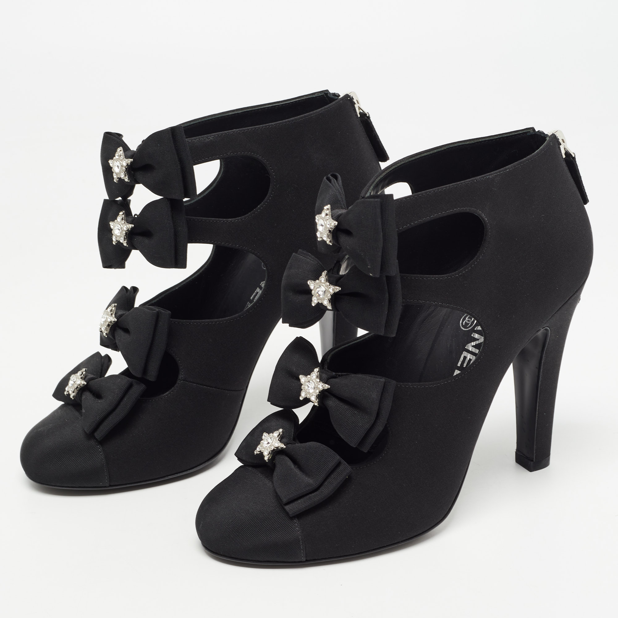 

Chanel Black Canvas Cutout Bow Ankle Boots Size