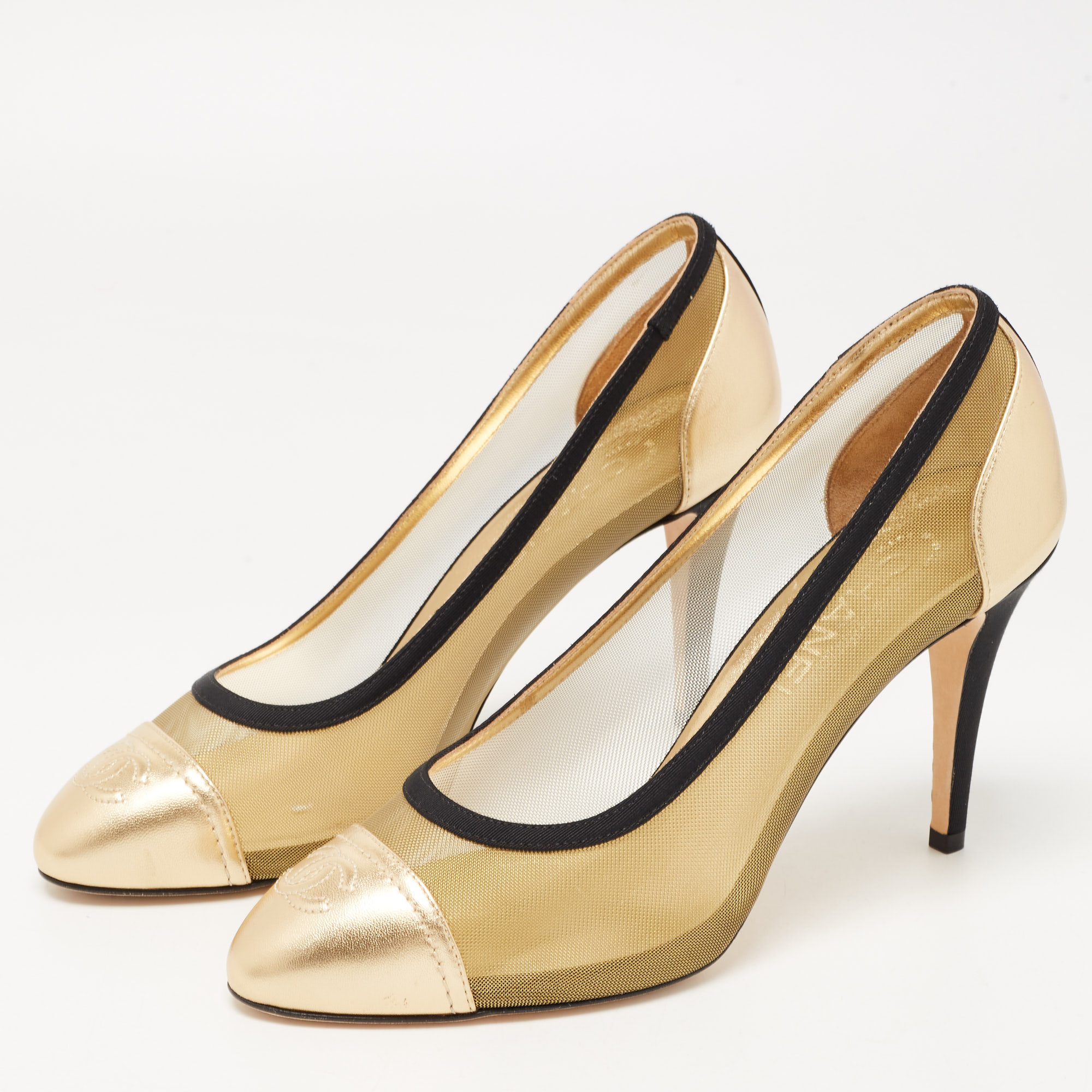 

Chanel Gold/Black Leather And Mesh CC Cap Toe Pumps Size