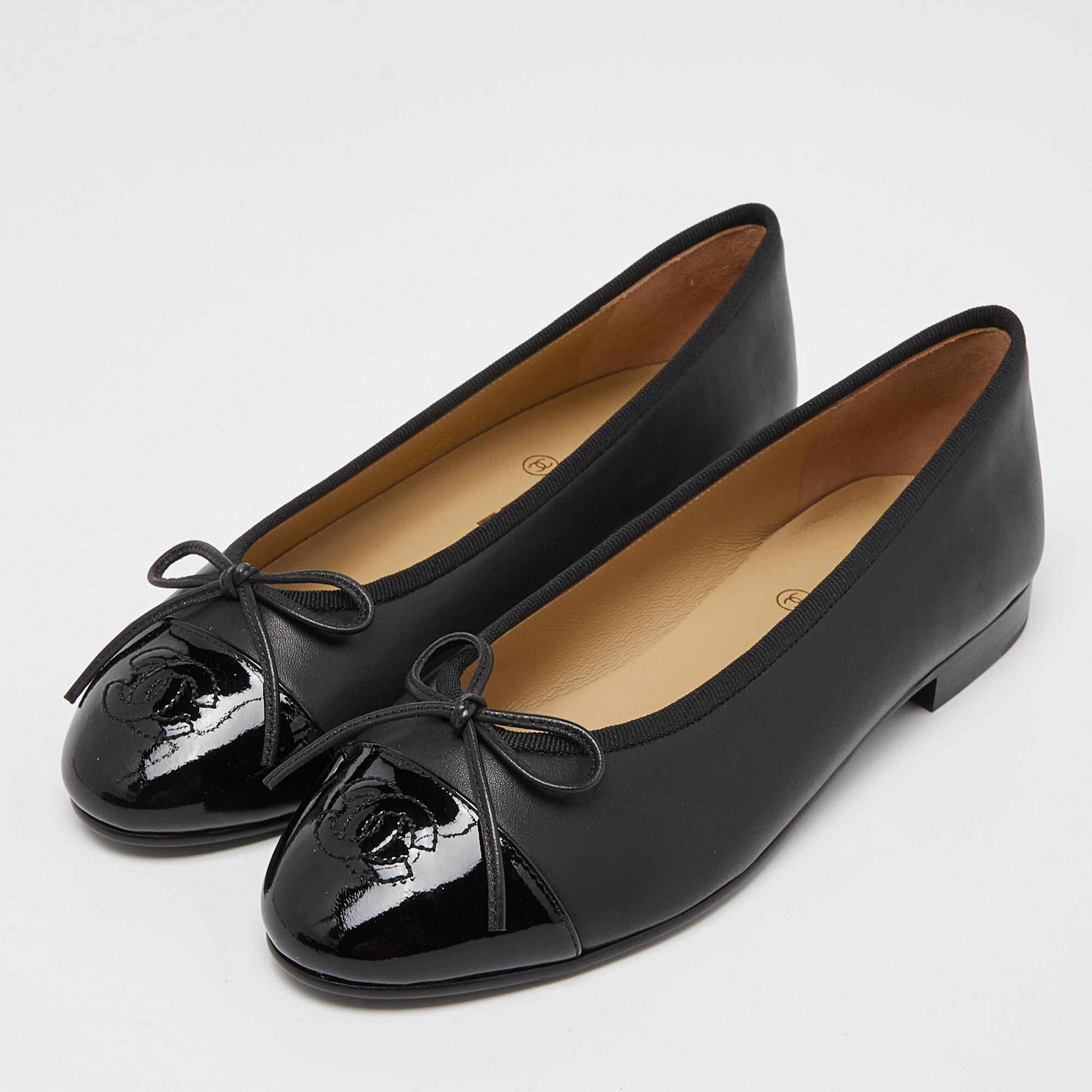 

Chanel Black Leather and Patent CC Cap Toe Bow Ballet Flats Size