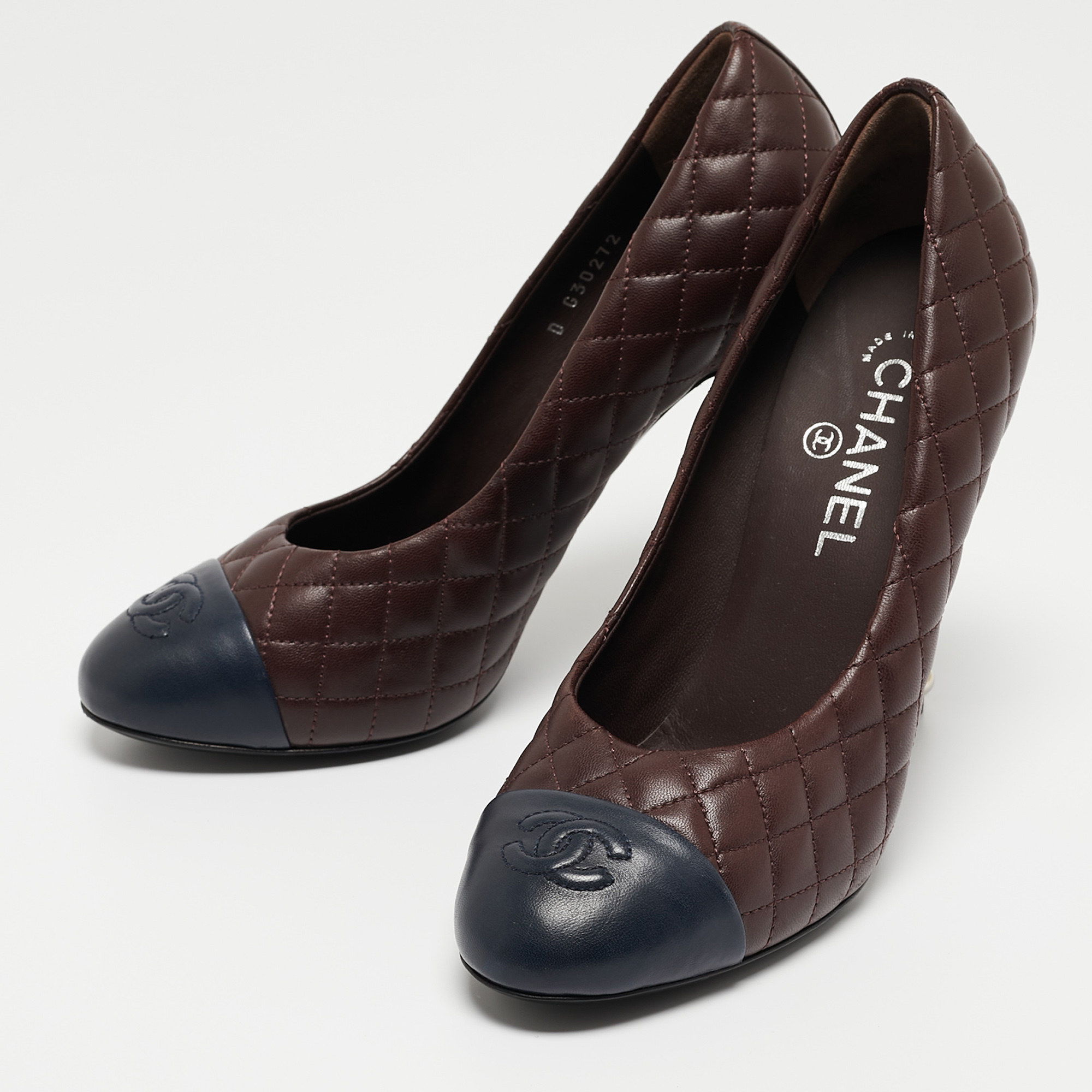 

Chanel Burgundy/Navy Blue Quilted Leather CC Cap Toe Pumps Size