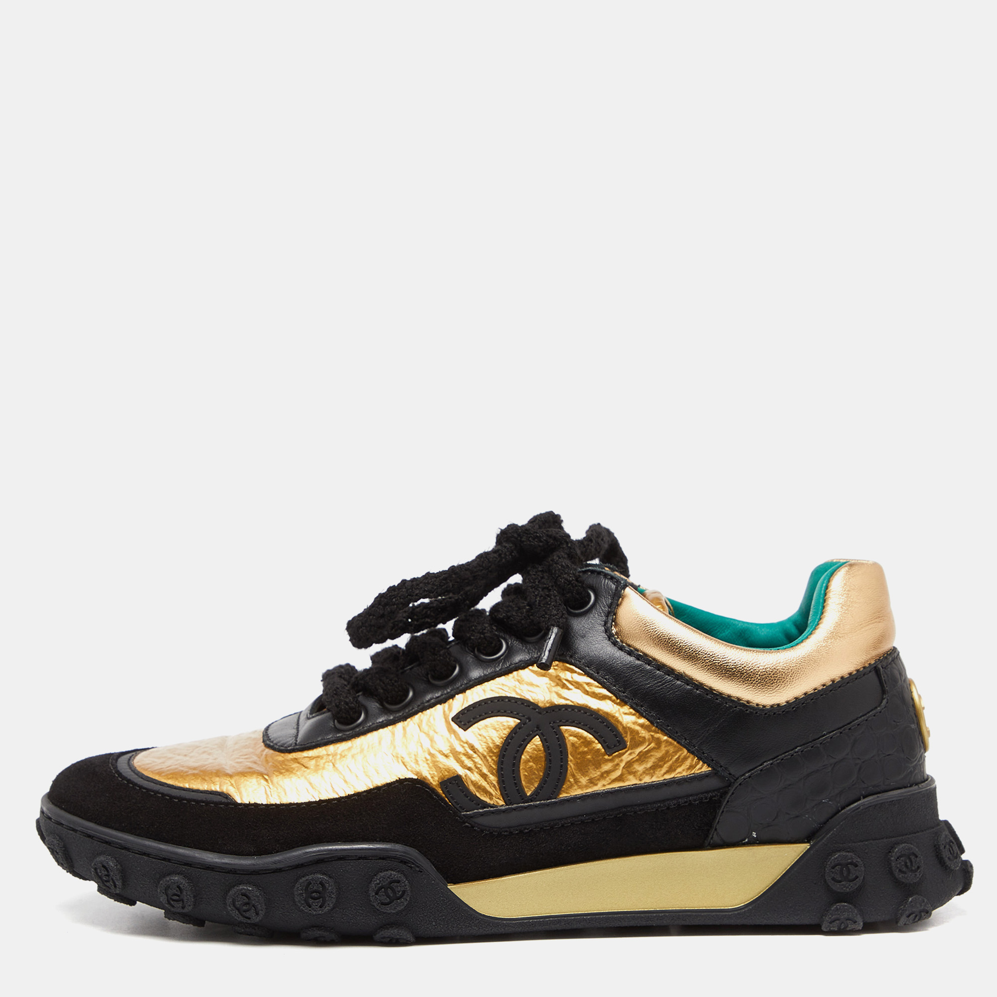 These sneakers from Chanel are amazingly stylish The exterior of the sneakers flaunts a mix of materials and hues while featuring a sturdy silhouette and logo on the counters. They come equipped with comfortable leather lined insoles laced vamps and tough rubber soles.