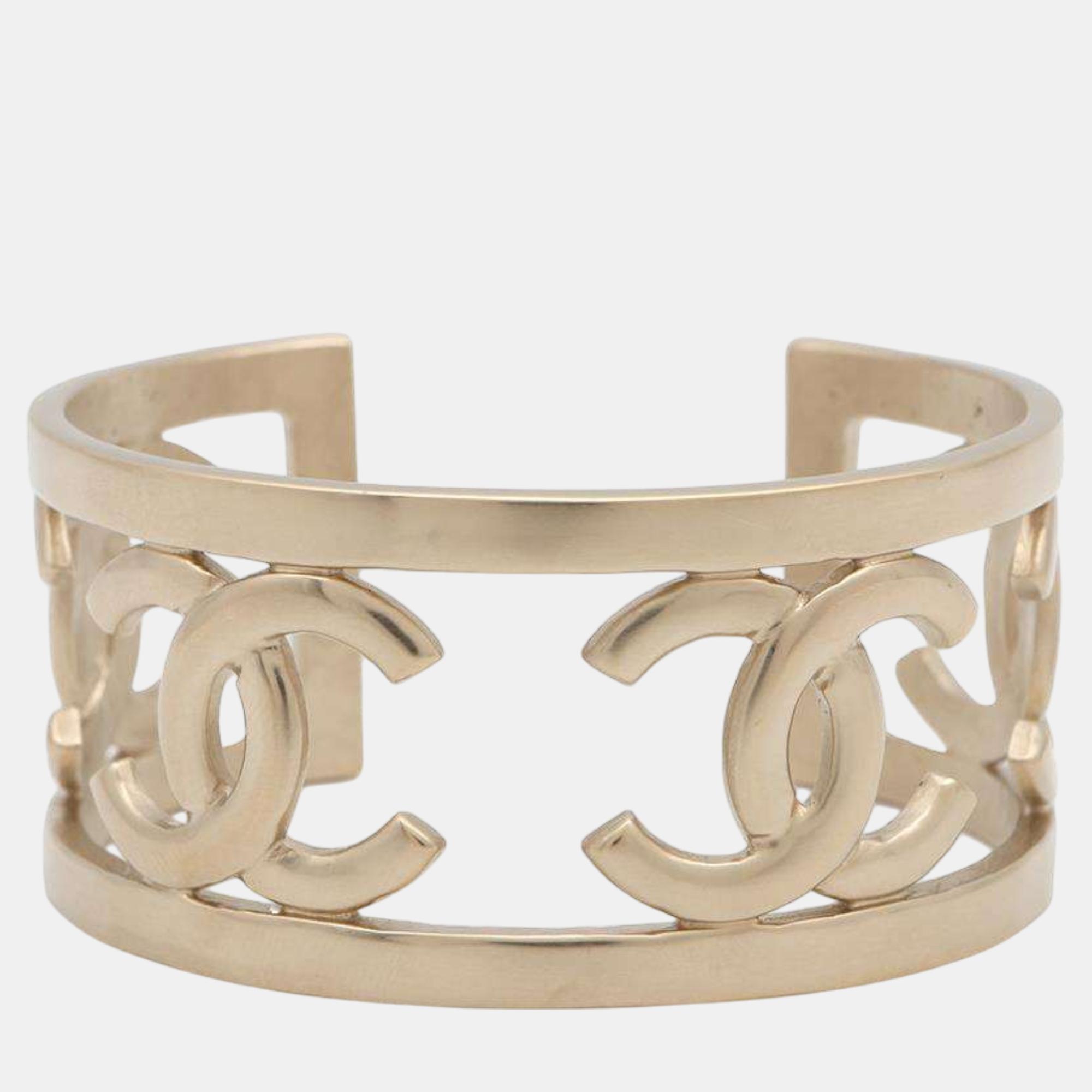 

Chanel Champagne Gold Metal Cc Logo Bangle Bracelet