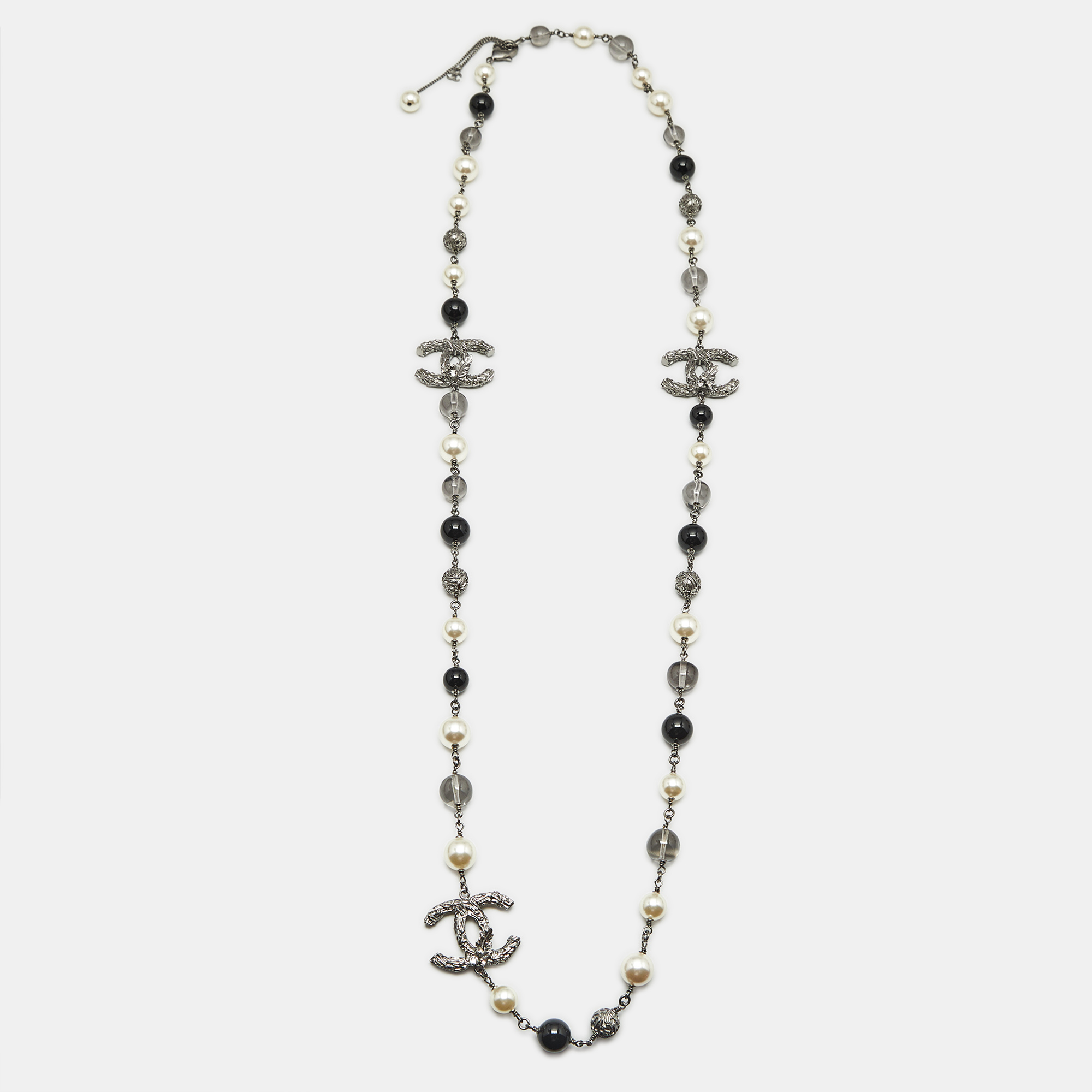 

Chanel CC Faux PearlCrystals Beaded Star Silver Tone Long Necklace