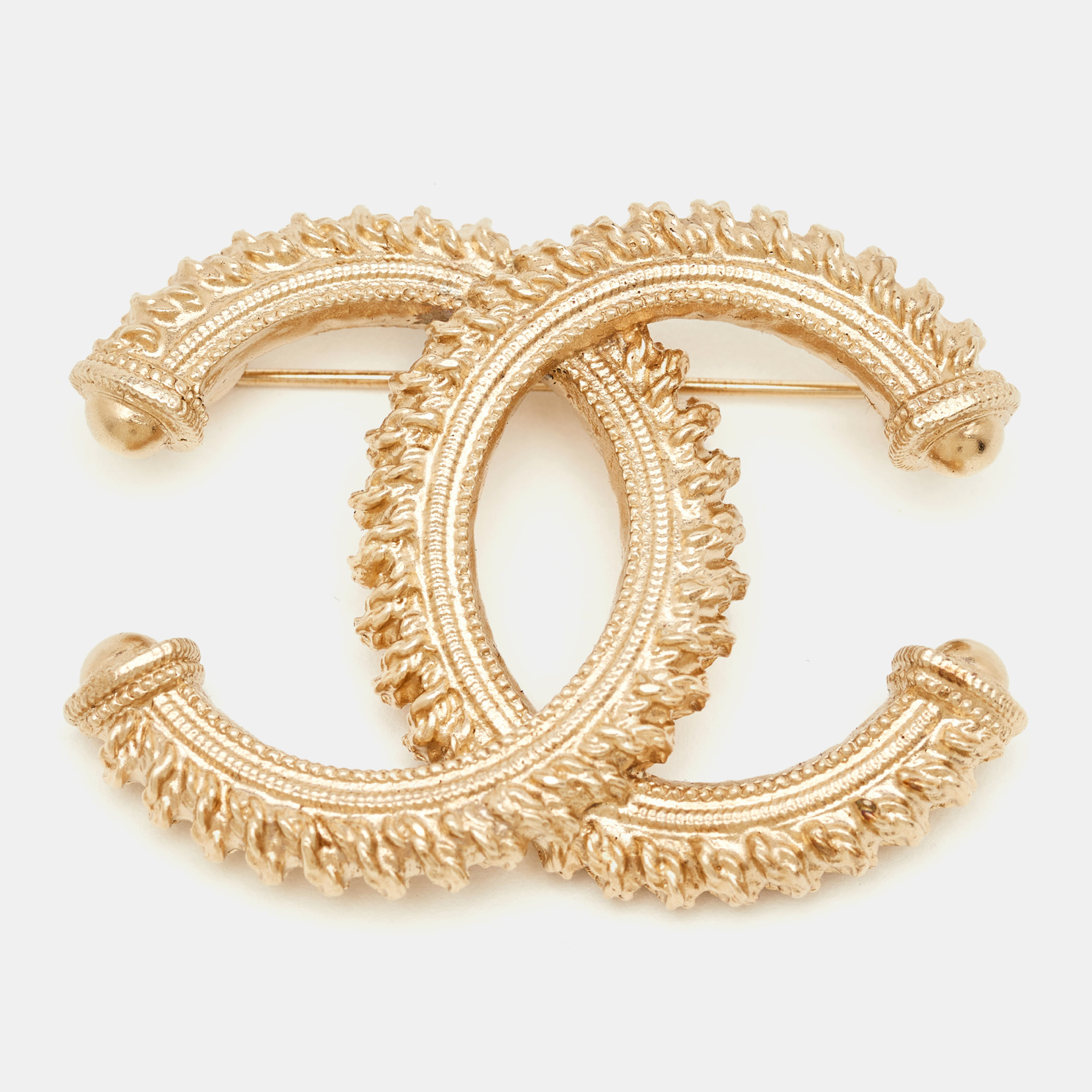 

Chanel CC Gold Tone Textured Pin Brooch