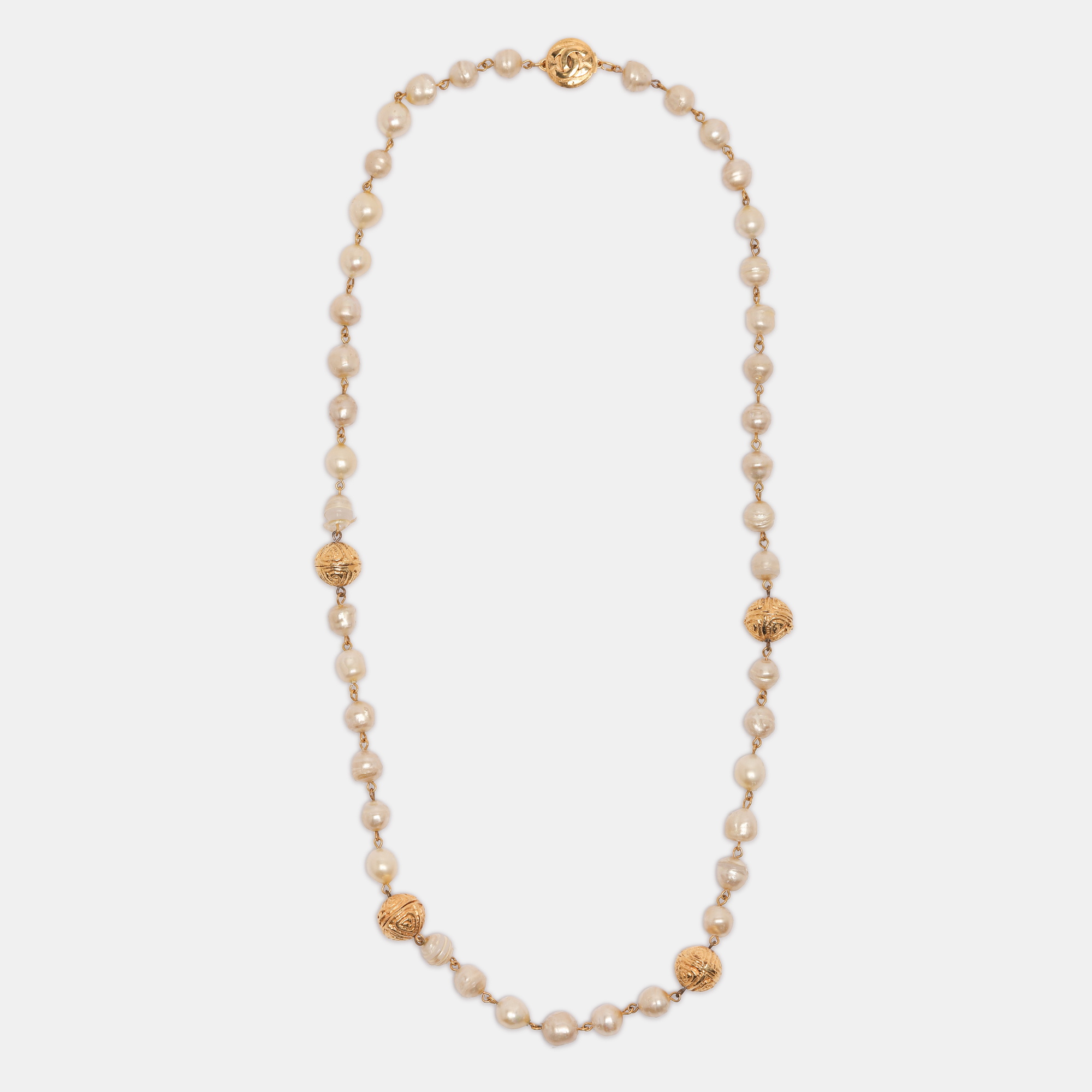 

Chanel Gold Tone CC Logo White Faux Pearl Station Necklace
