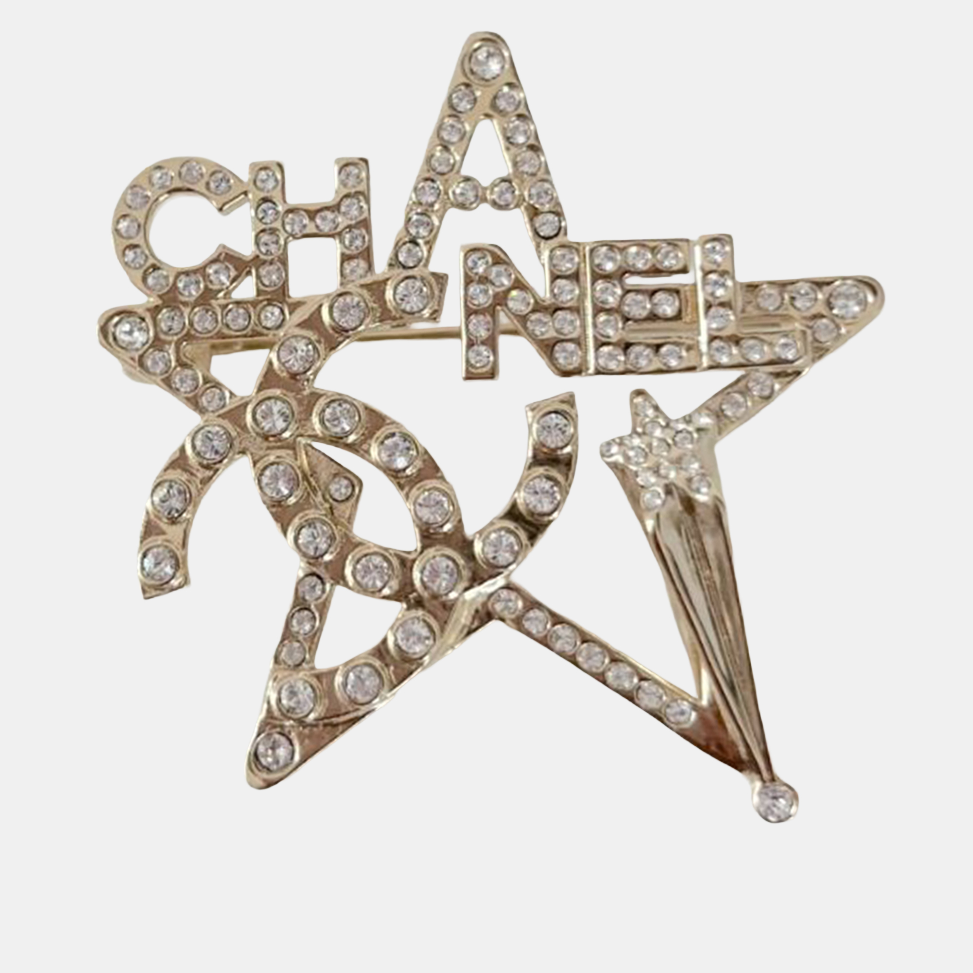 

Chanel Star light gold crystal star brooch