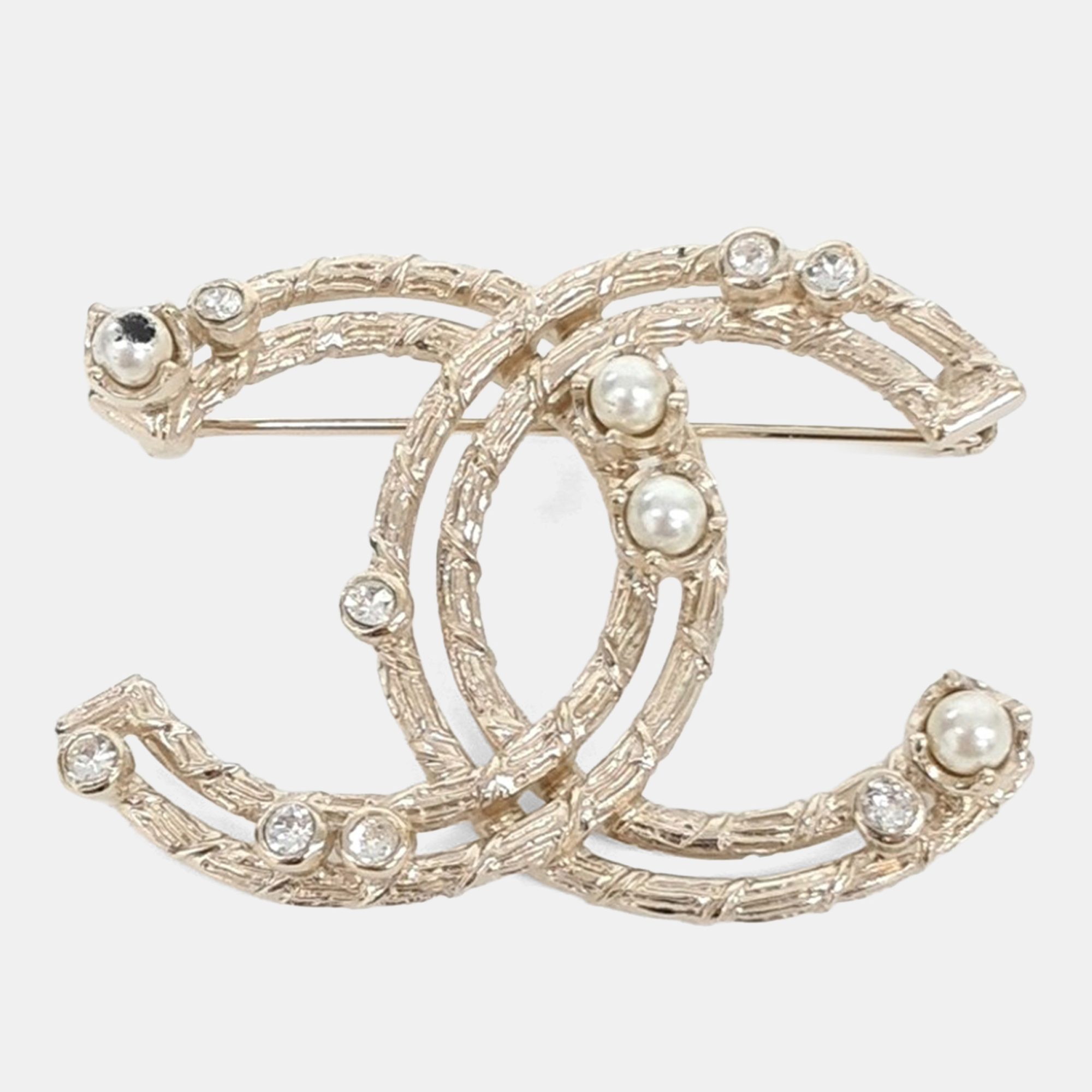 

Chanel Gold Tone brooch