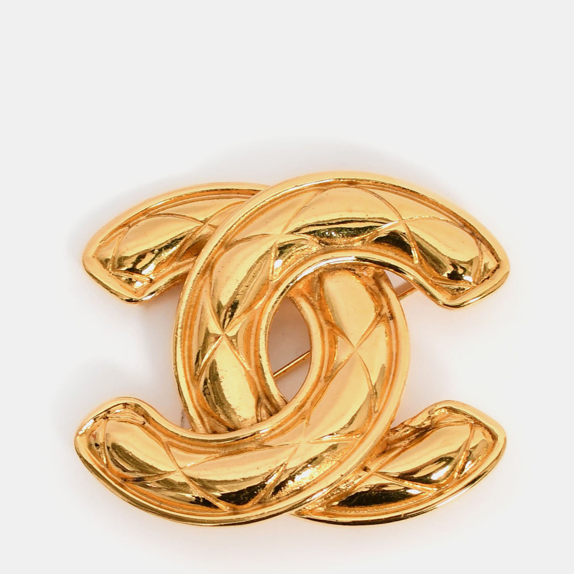 

Chanel Gold Tone CC Brooch