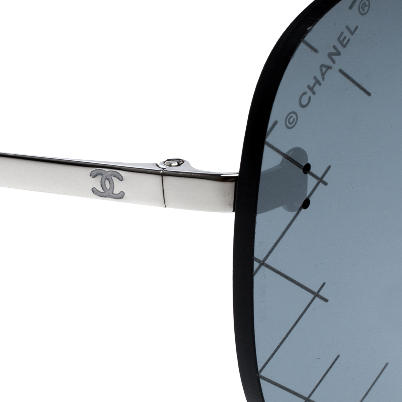 Chanel Silver/Black 71158 Mirror Quilted Rimless Shield Sunglasses Chanel |  The Luxury Closet