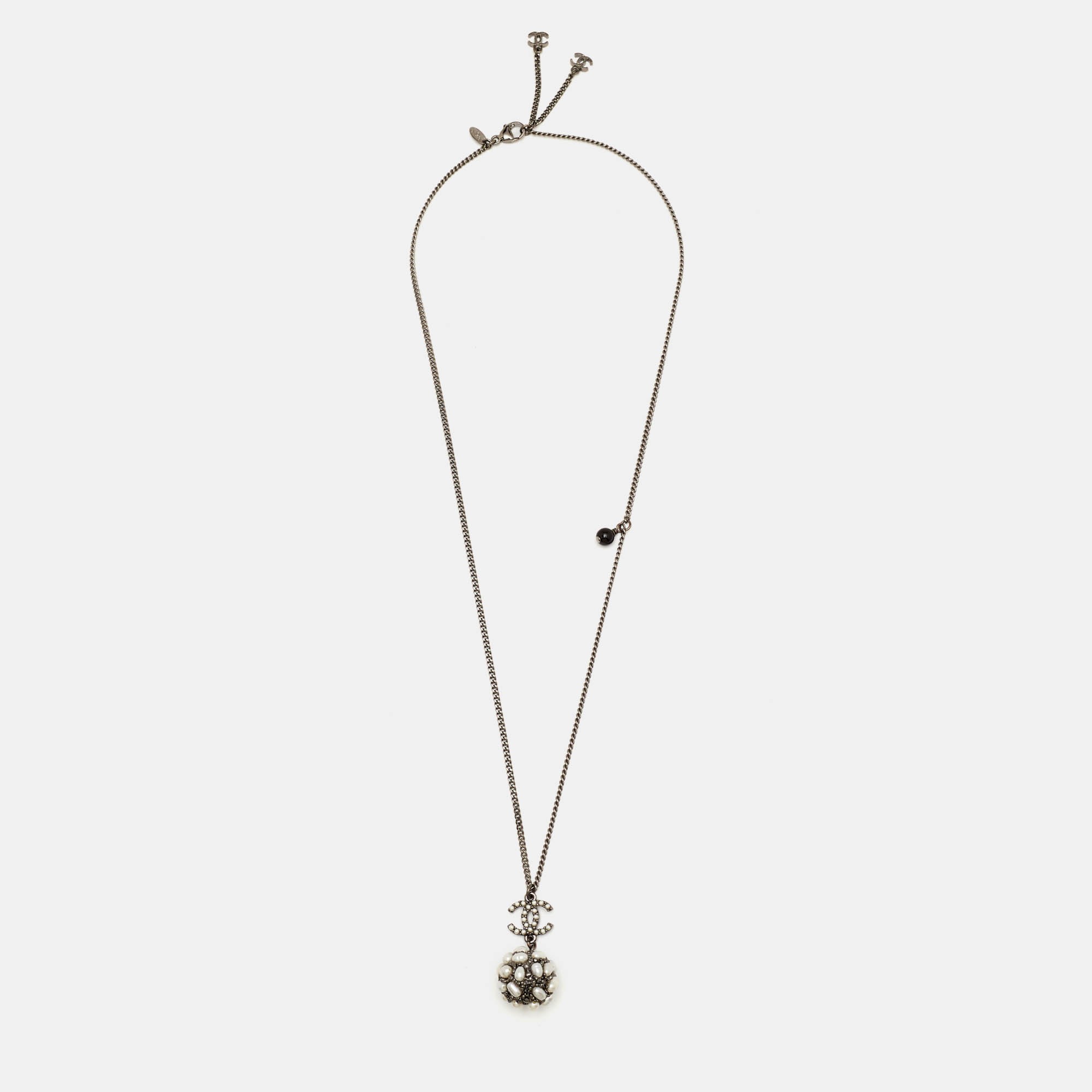

Chanel Faux Pearl Gunmetal Tone Pendant Necklace, Grey