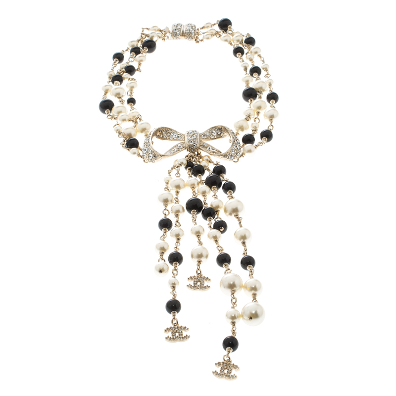 Pre Owned Chanel Faux Pearl Bead & Crystal Gold Tone Bow Multi Strand Tassel Necklace