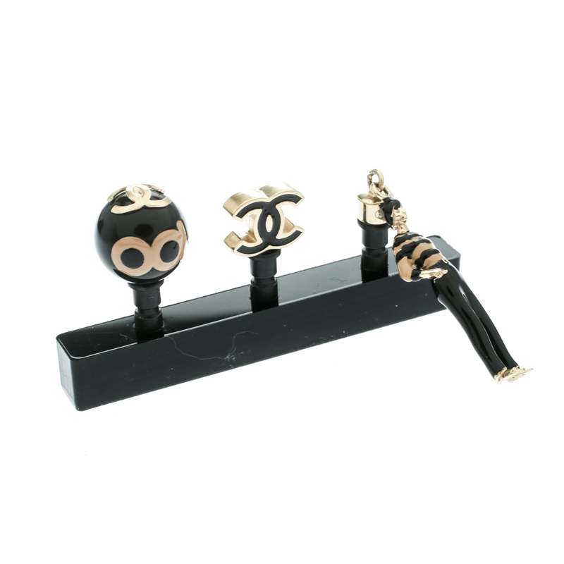 

Chanel CC Smartphone Dust Plugs, A Set Of Three Enamel Charms, Black