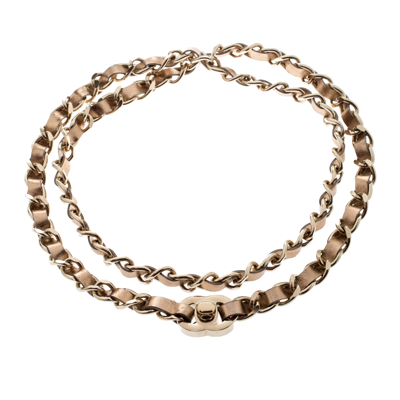 

Chanel CC Turn Lock Metallic Leather Woven Gold Tone Chain Belt