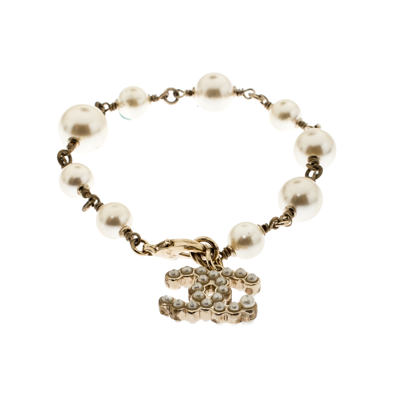 

Chanel CC Faux Pearl Gold Tone Bead Charm Bracelet