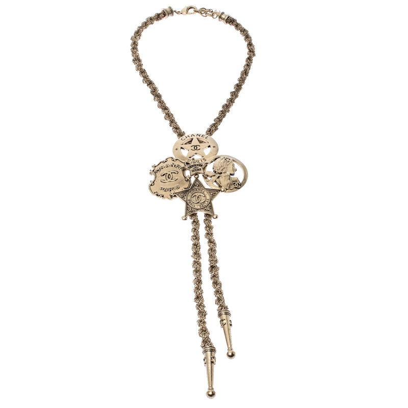 

Chanel Paris-Dallas Sheriff Star Gold Tone Bolo Necklace