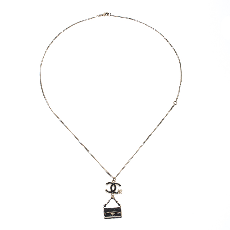 

Chanel CC Black Enamel Gold Tone Flap Bag Charm Pendant Necklace