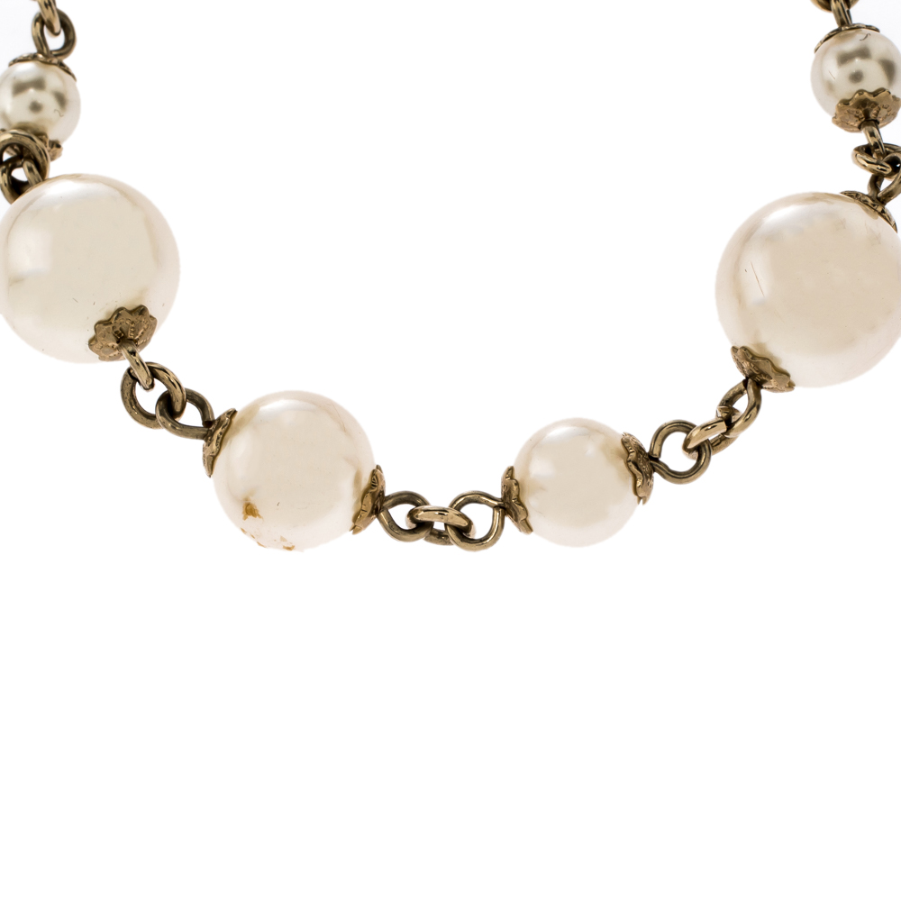 

Chanel CC Faux Pearl Enamel Gold Tone Charm Bracelet