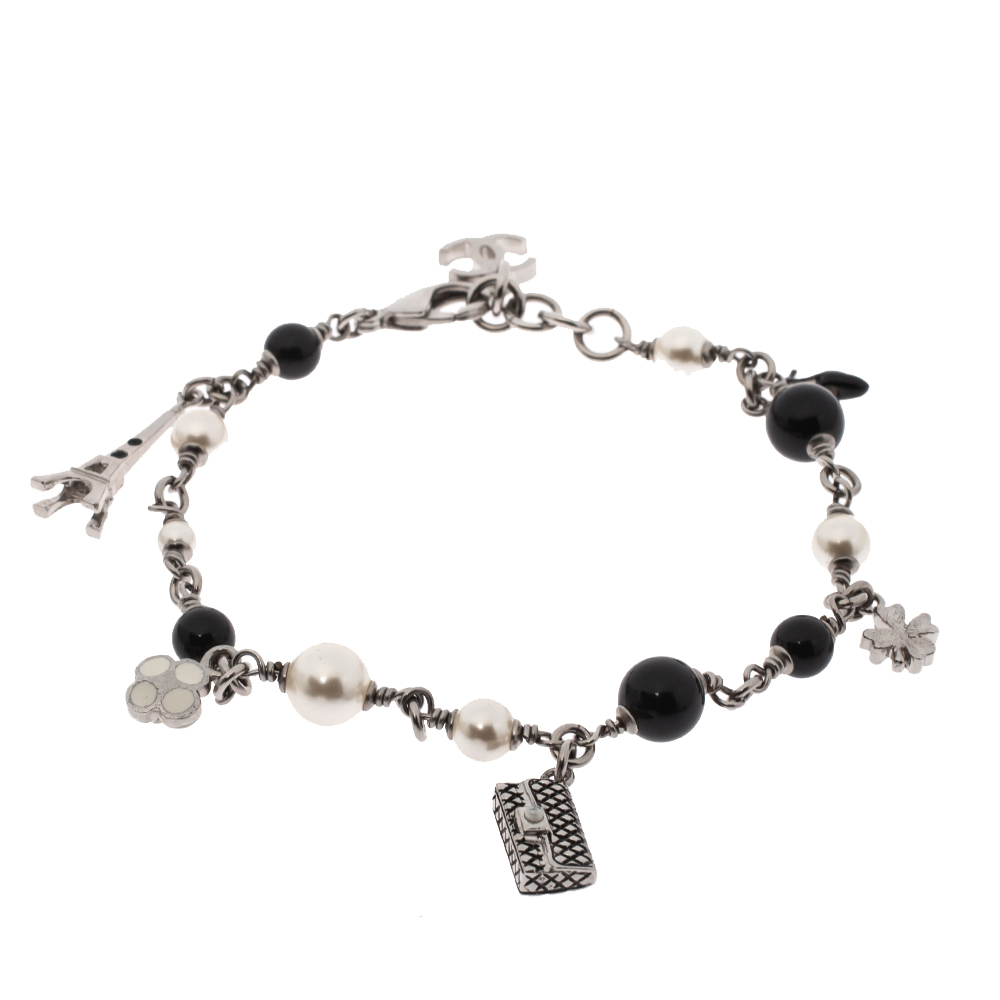 

Chanel Faux Pearl Black Bead Multi Charm Silver Tone Bracelet