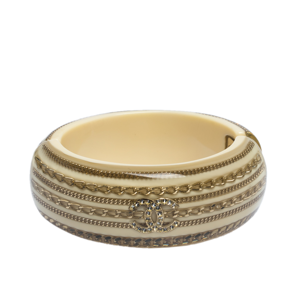 

Chanel Resin & Crystal CC Gold Tone Oval Bangle, Cream