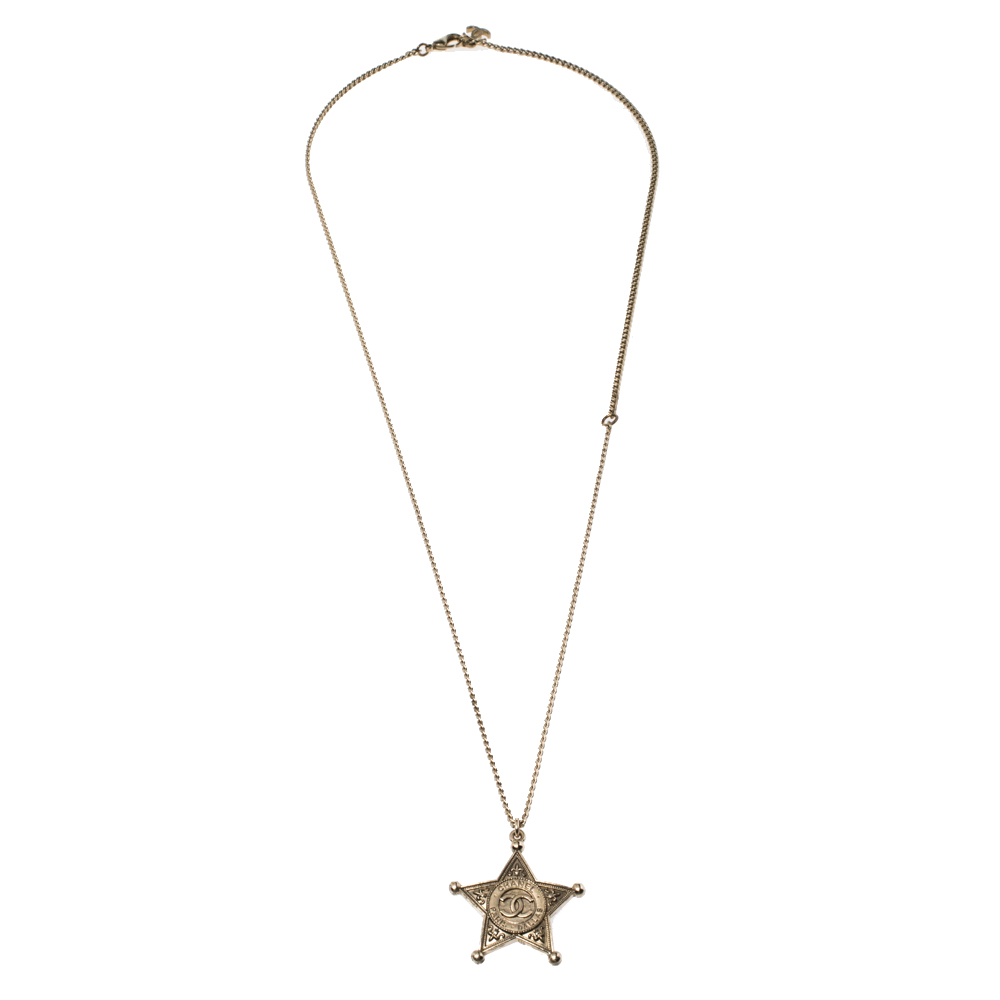 

Chanel Aged Gold Tone Paris-Dallas Star Pendant Necklace