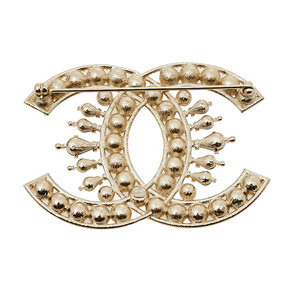 

Chanel Gold Tone Crystal CC Pin Brooch