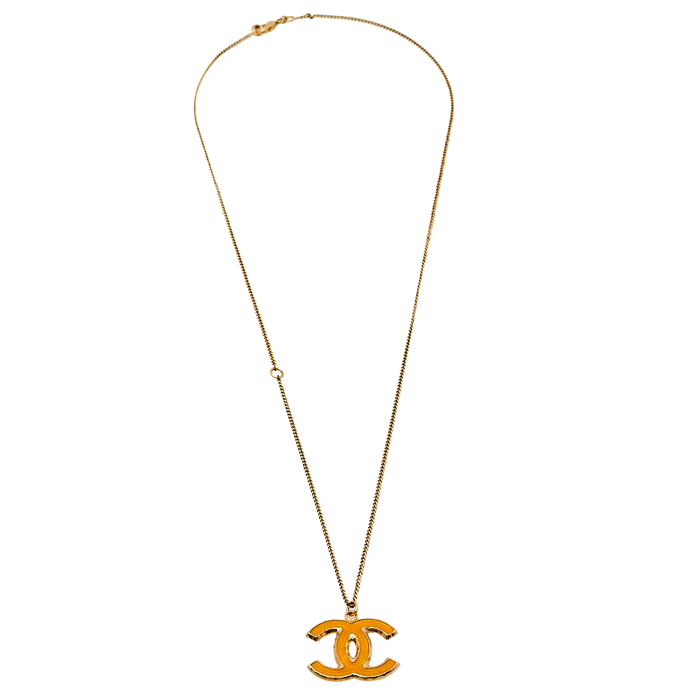 

Chanel Gold Tone Enamel CC Pendant Necklace, Yellow