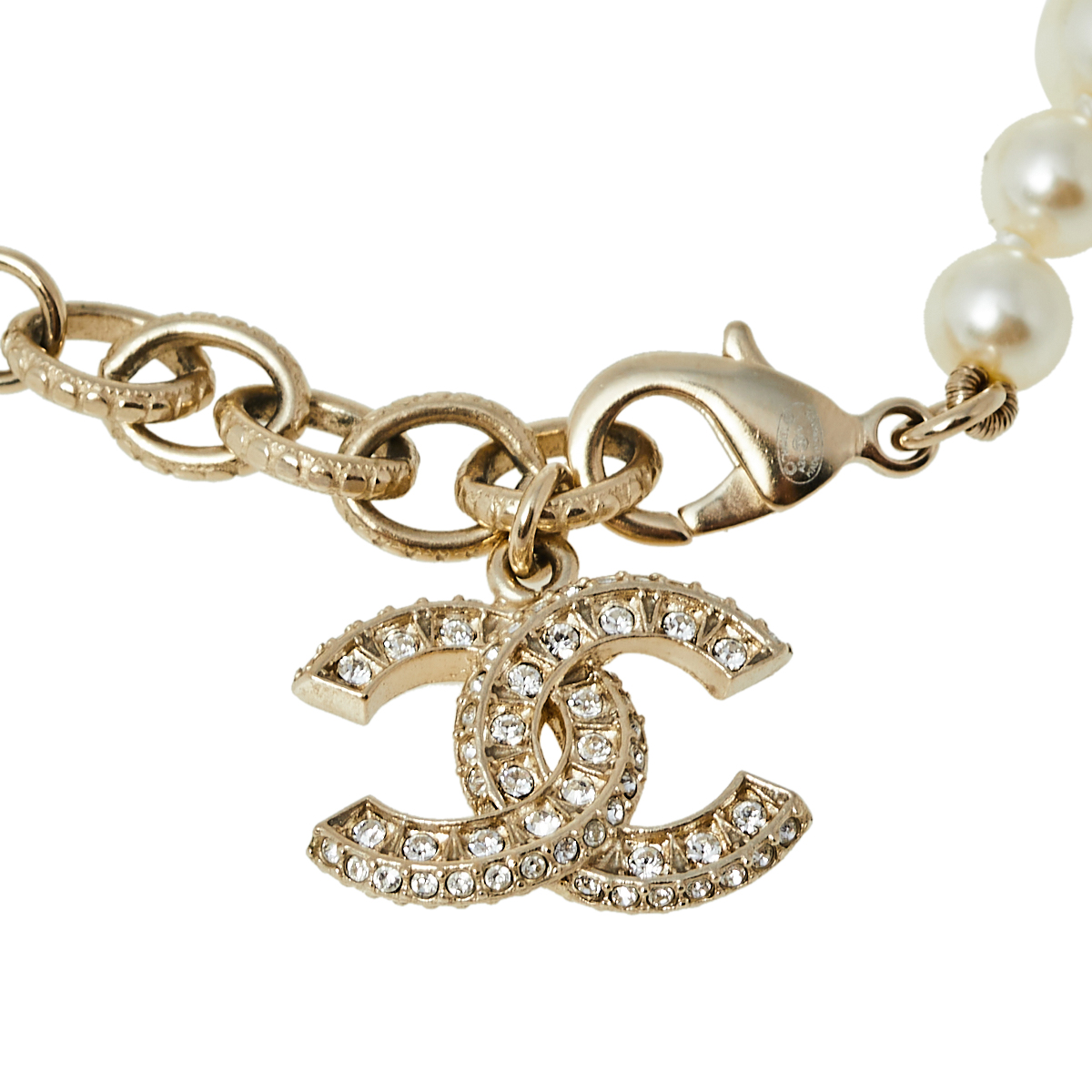 

Chanel Cream Faux Pearl & Crystal CC Charm Gold Tone Bracelet