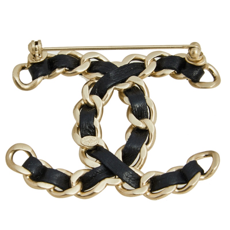 

Chanel Pale Gold Tone Black Leather Woven CC Pin Brooch
