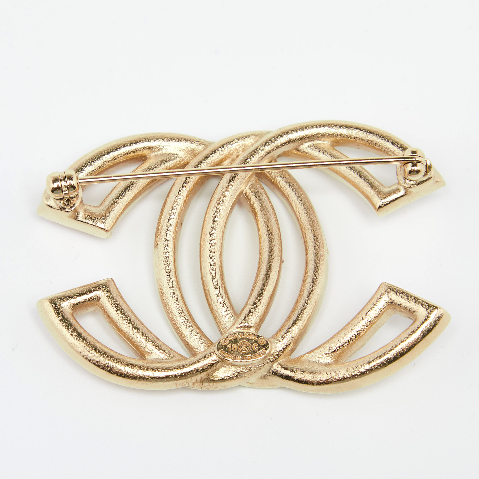 

Chanel Light Gold Pink Crystal CC Pin Brooch