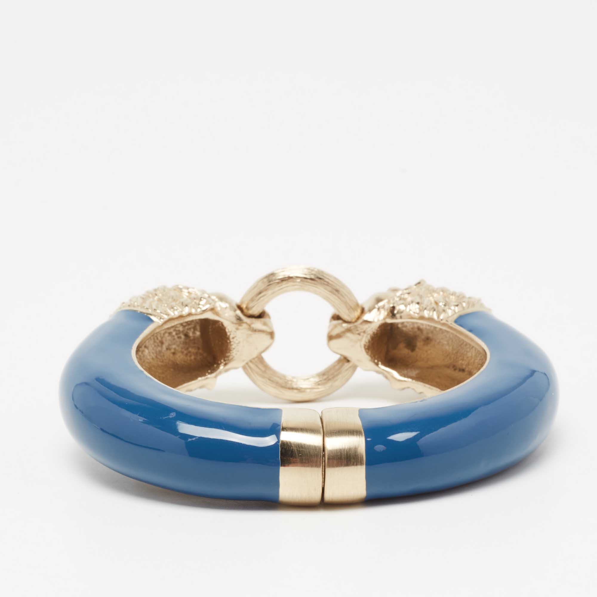 

Chanel Blue Enamel Gold Tone Lion Head Magnetic Bracelet