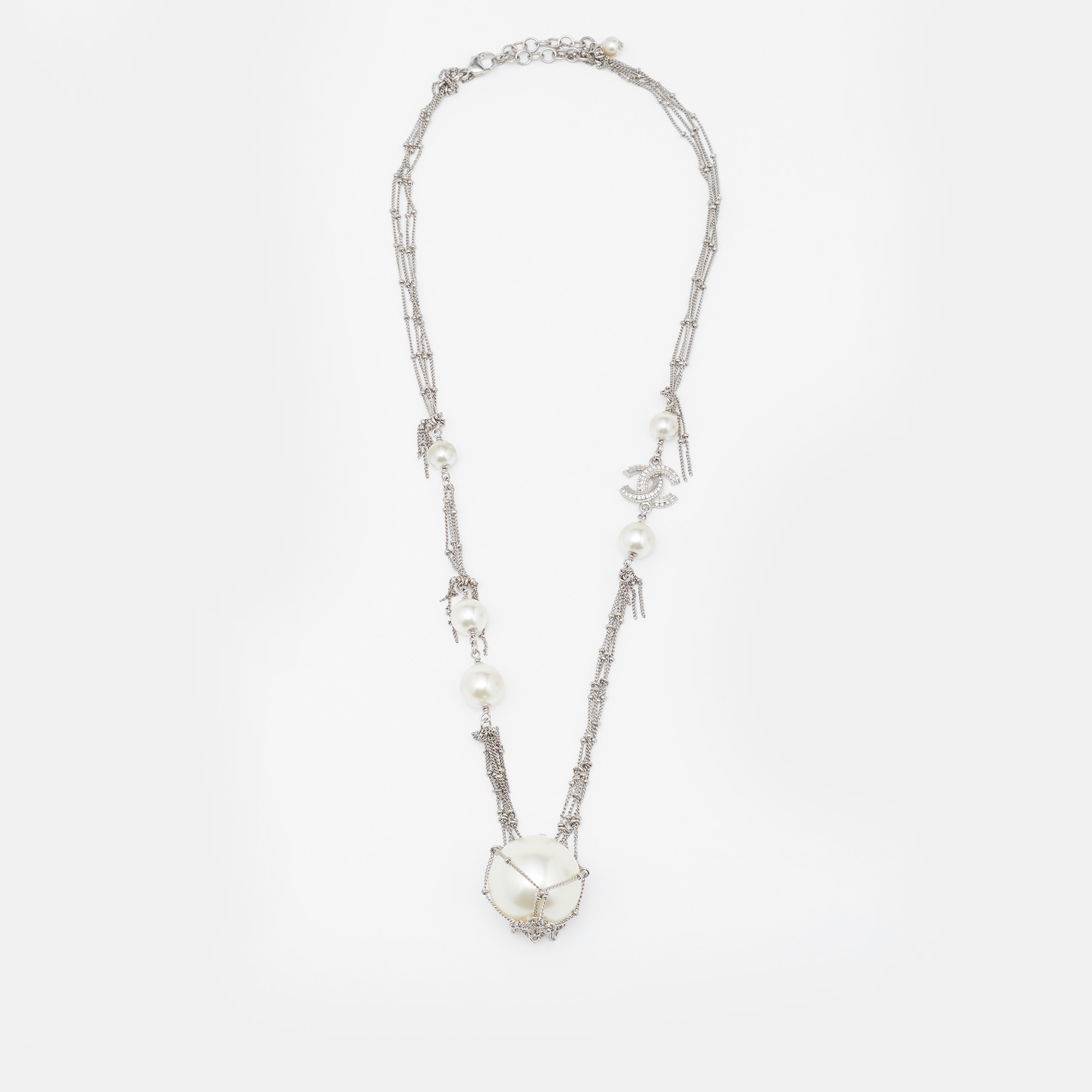 

Chanel Silver Tone Crystal CC Charm Faux Pearl Multi Strand Necklace