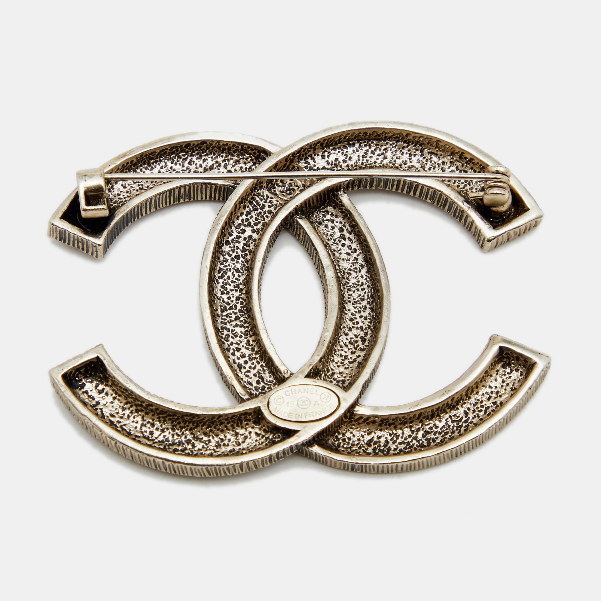 

Chanel CC Gold Tone Pin Brooch